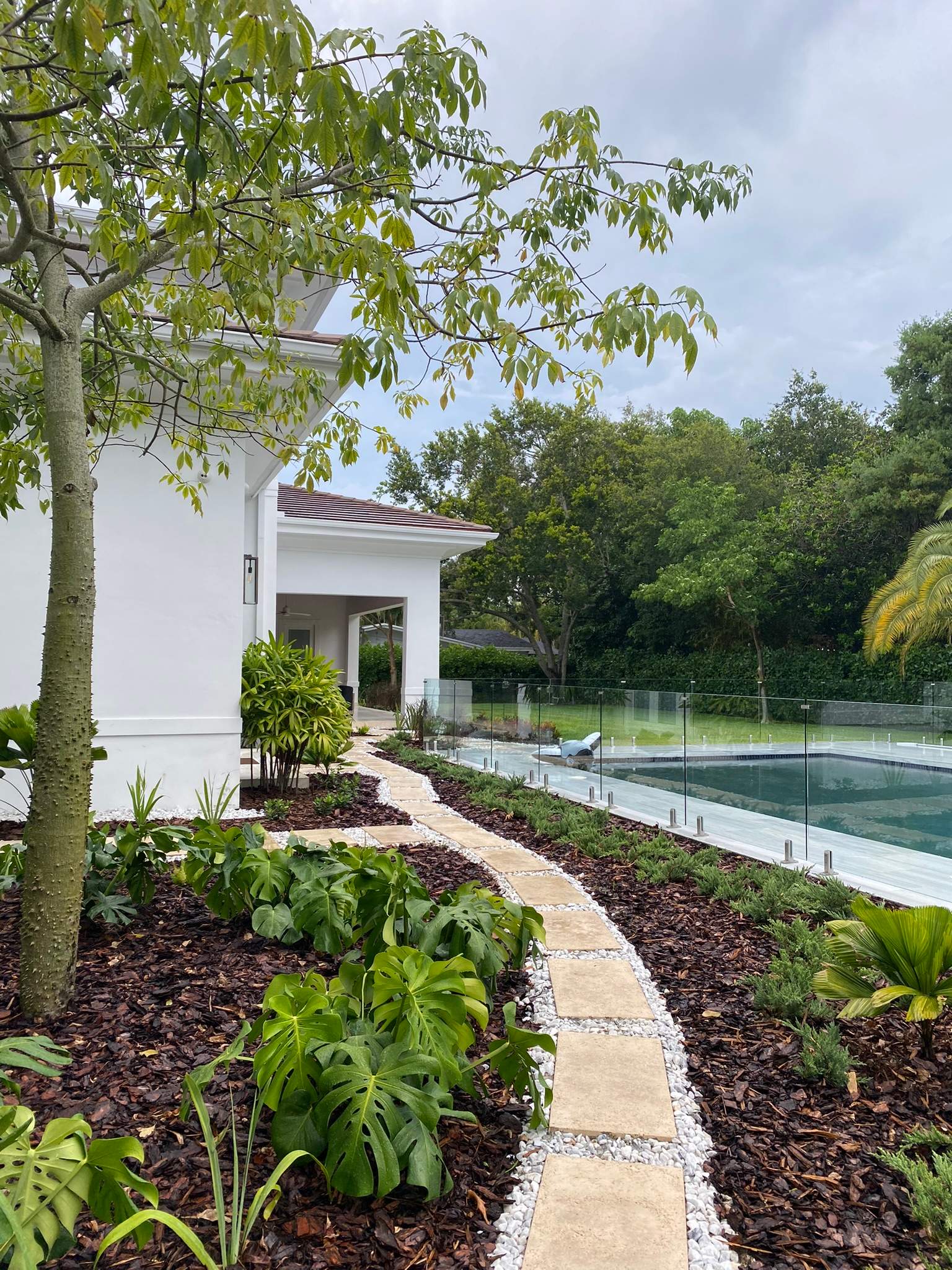 Backyard Landscape Renovation by Nature's Dream Landscape and Tree Service