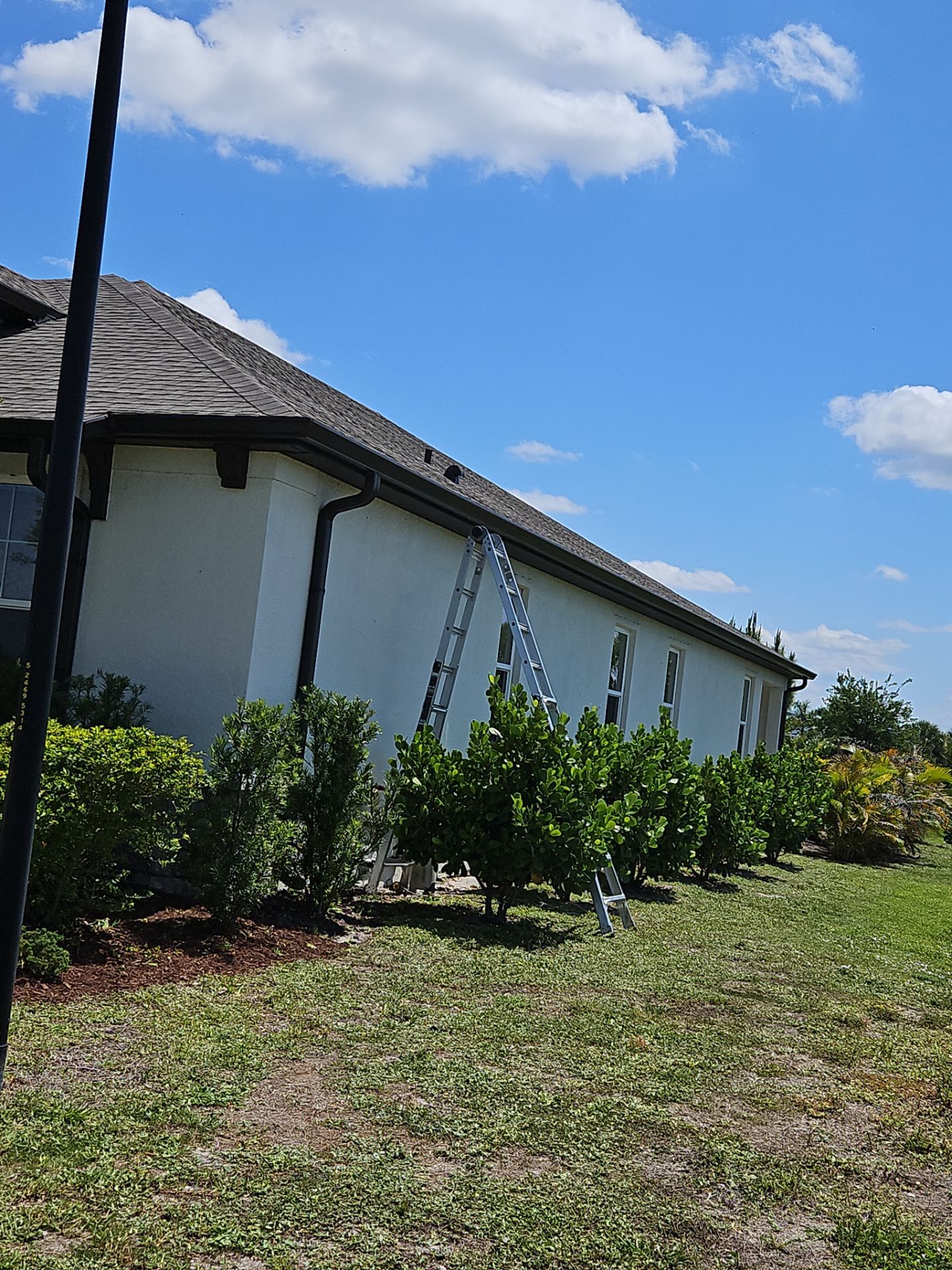 K-Style Seamless Gutter Installation using bronze gutters in Sarasota FL by Gutter Professors