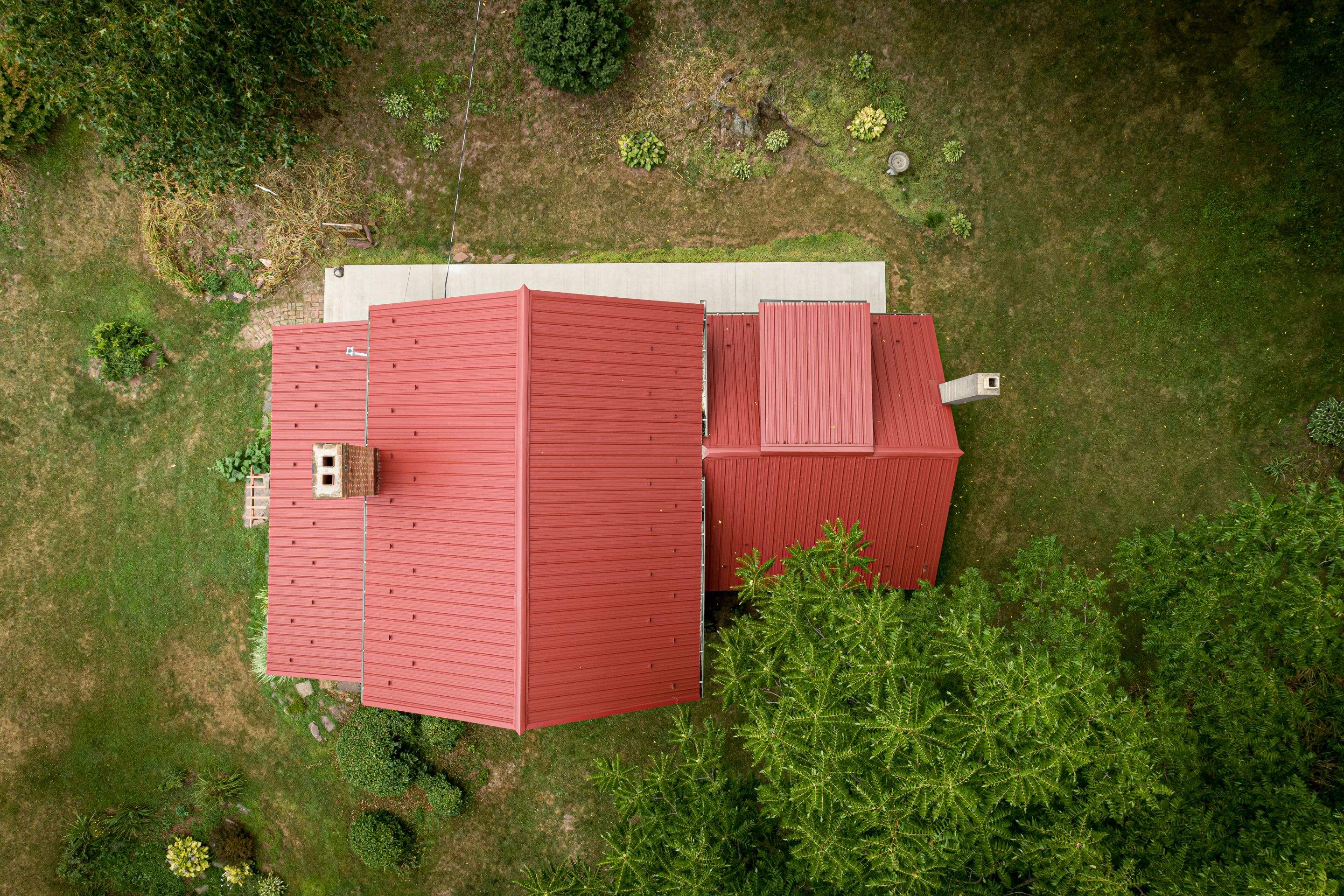 Metal Roof-colonial red by Esh Builders