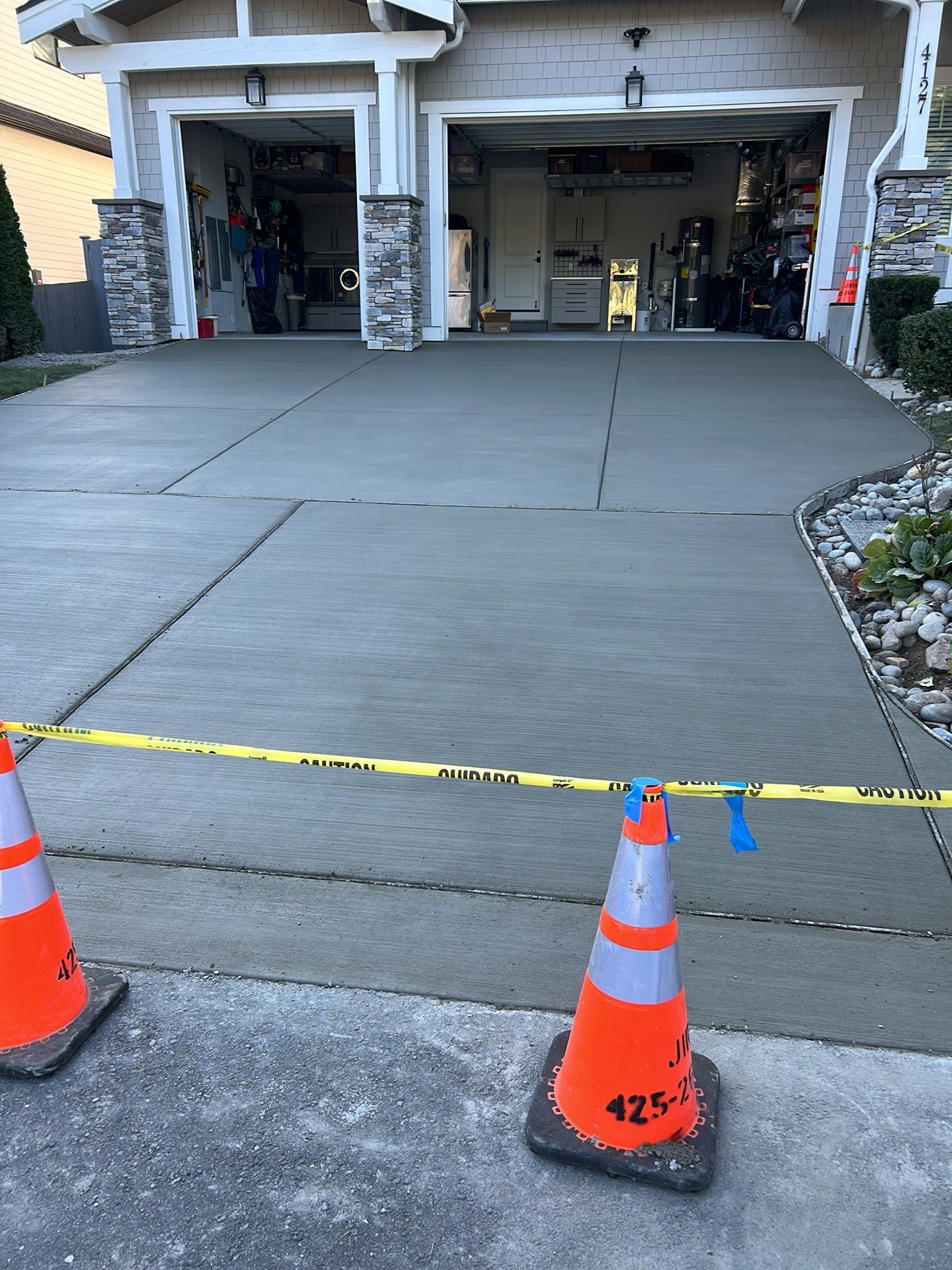 MN Custom Homes | Concrete Driveway  by Jireh Asphalt & Concrete Inc 