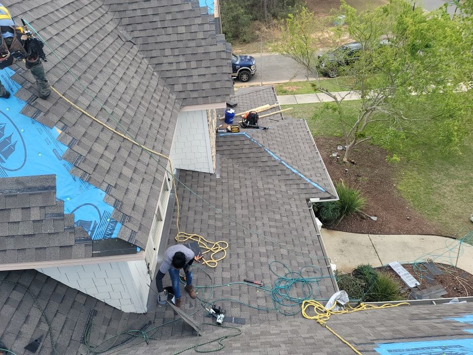 Residential Roofing Installation using Roof Replacement by American Roofing & Construction LLC