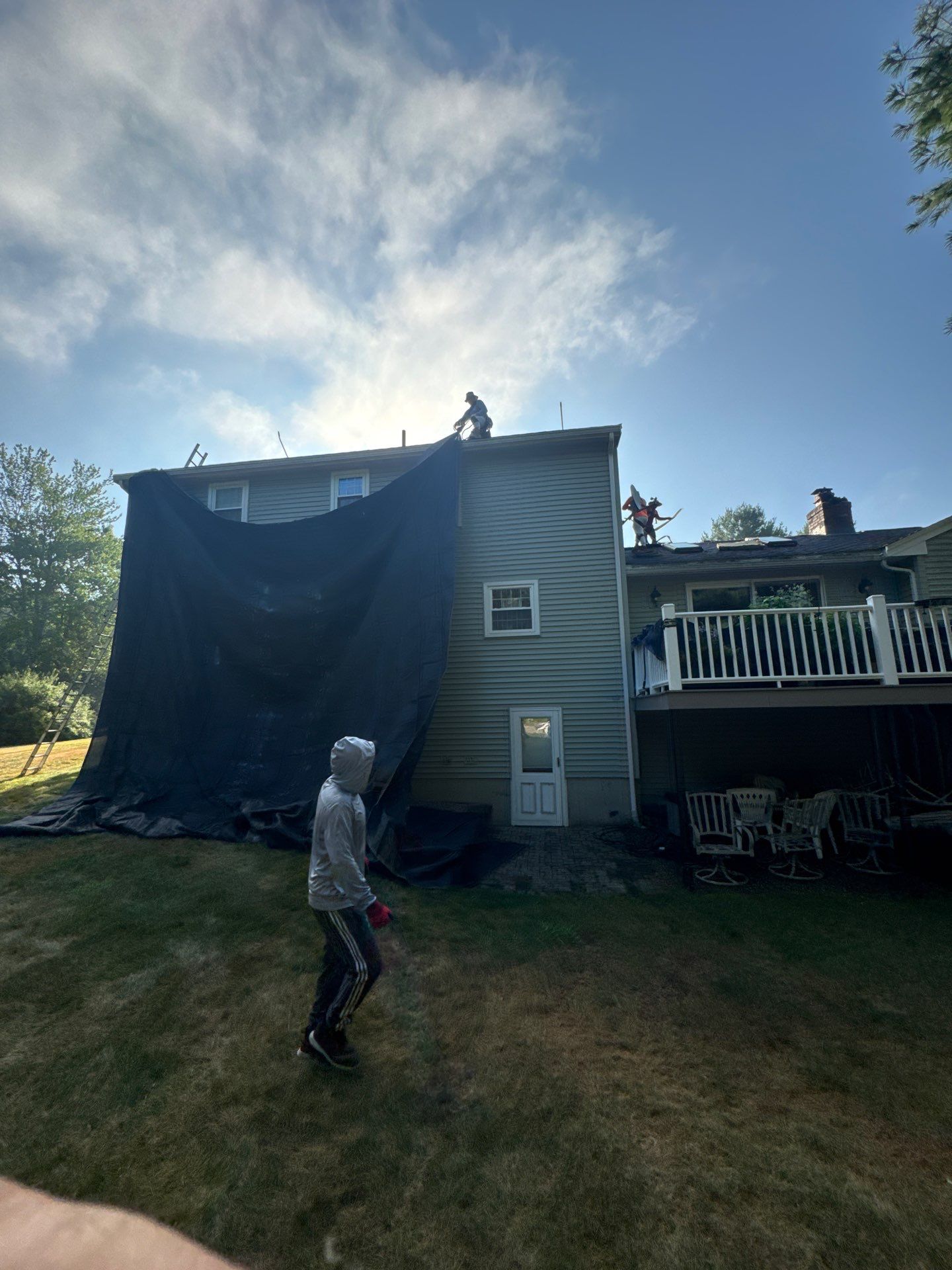 Complete Roof Replacement with Chimney Flashing, Gutter Guard System, and Vinyl Siding Repairs by Mighty Dog Roofing of Greater Middlesex County