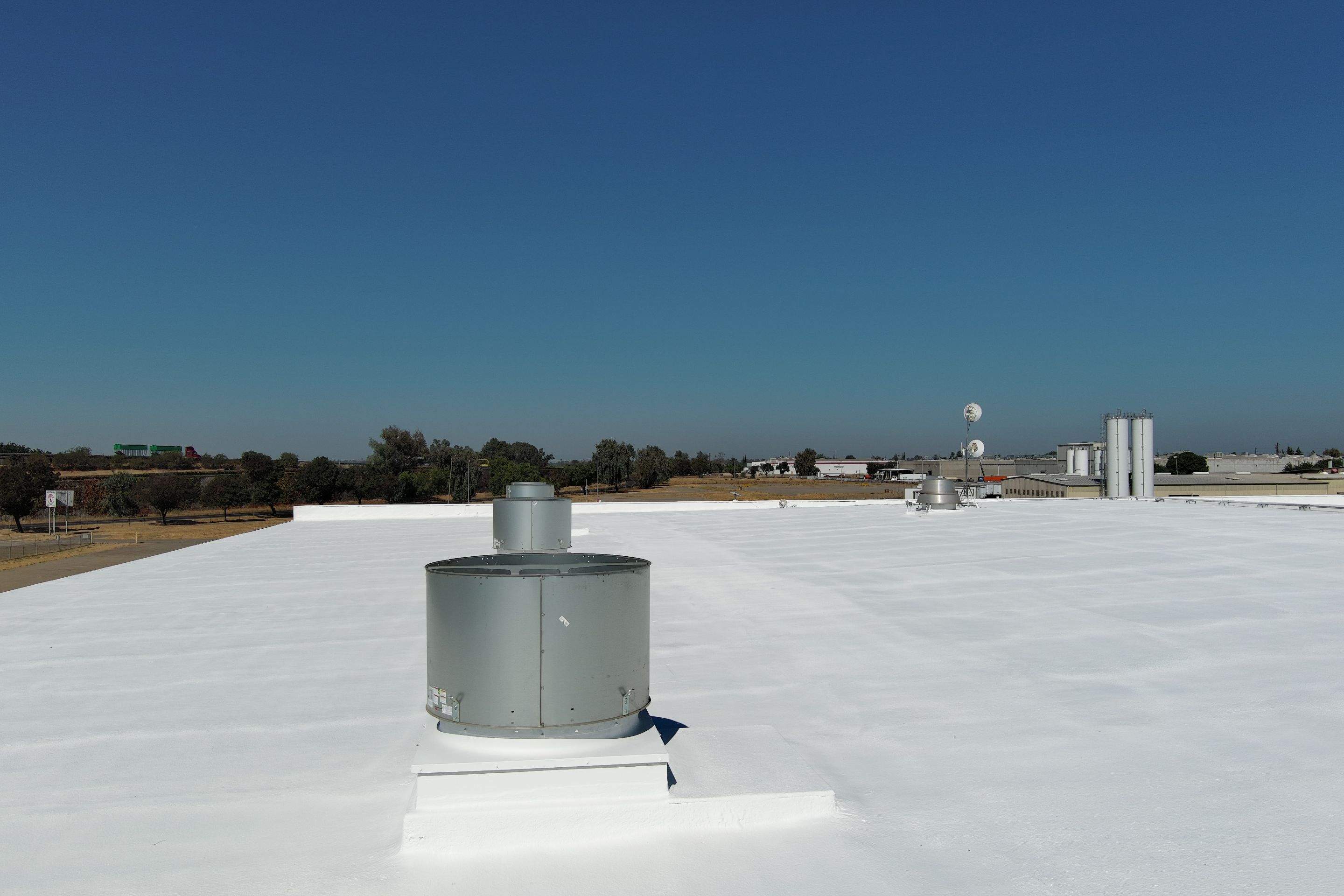 Pro Farms Spray foam roofing project by Straight Edge Roofing Inc