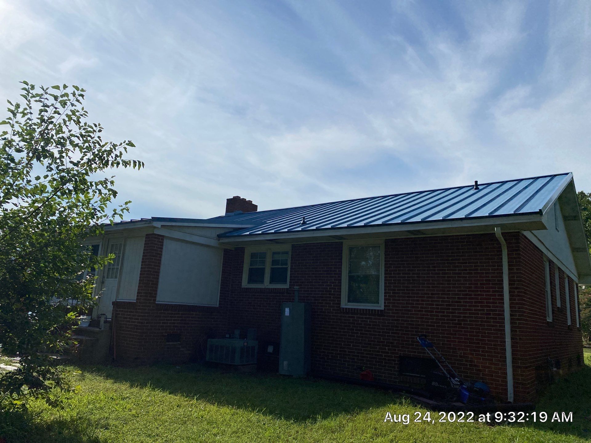 Carolina Blue Standing Seam Roof by Just In Time Roofing and Restoration