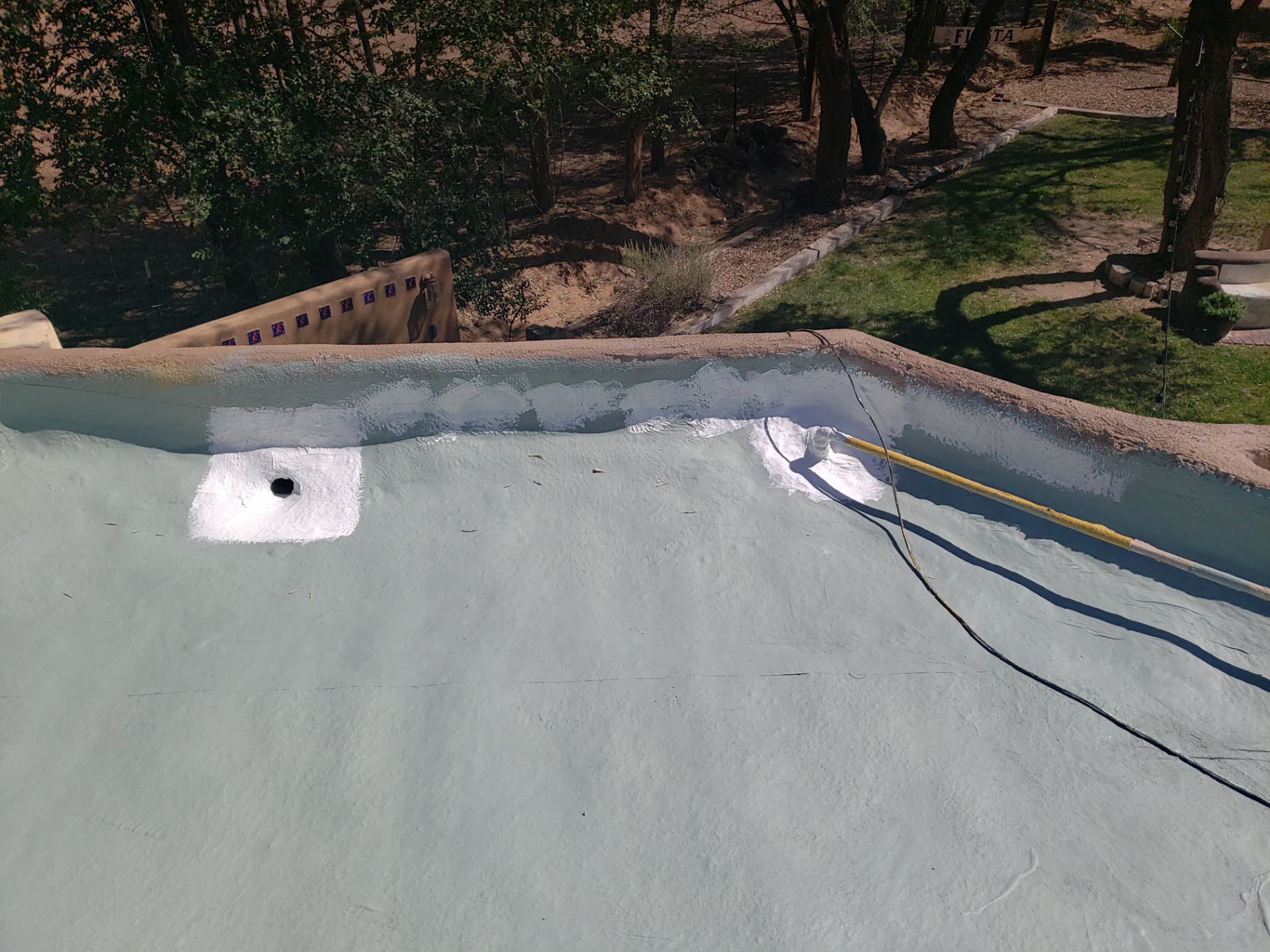 Residential roof application by SPF Services 