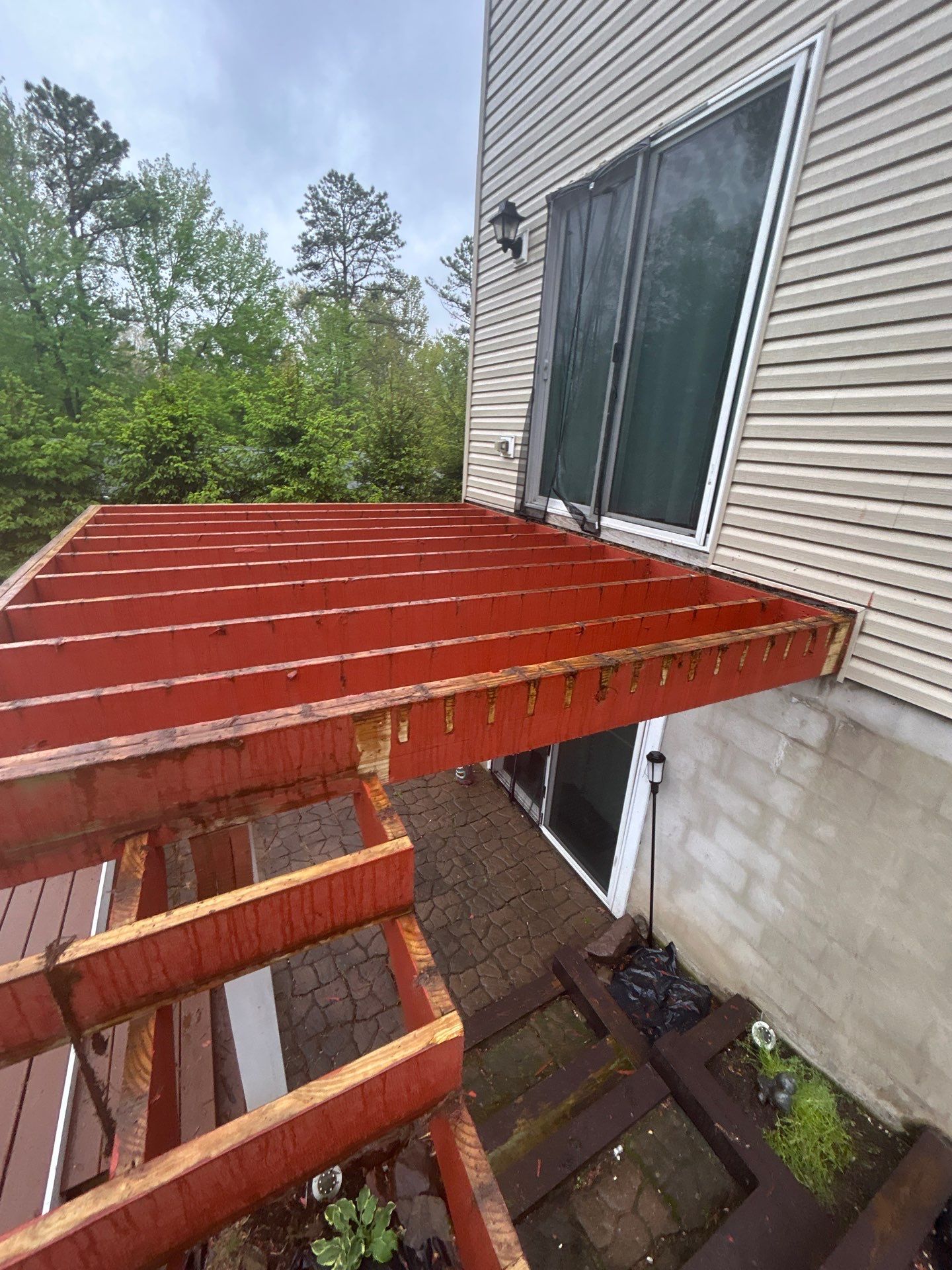 Elevated Composite Deck Replacement with White Railing in Tannersville by Herts Roofing & Construction