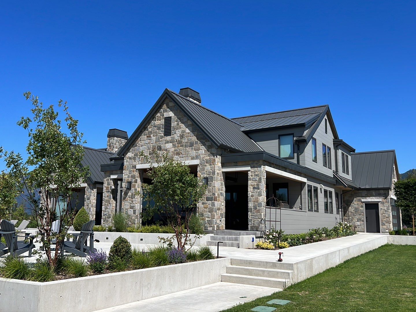 Residential Roofing Installation using 12" Prolok metal  by Top Notch Roofing Inc