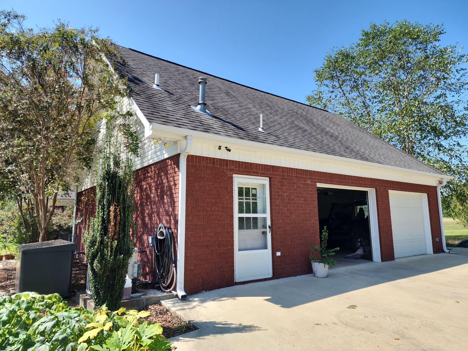 Residential Roofing Repair using CertainTeed XT25: Moire Black by Hostetler Roofing