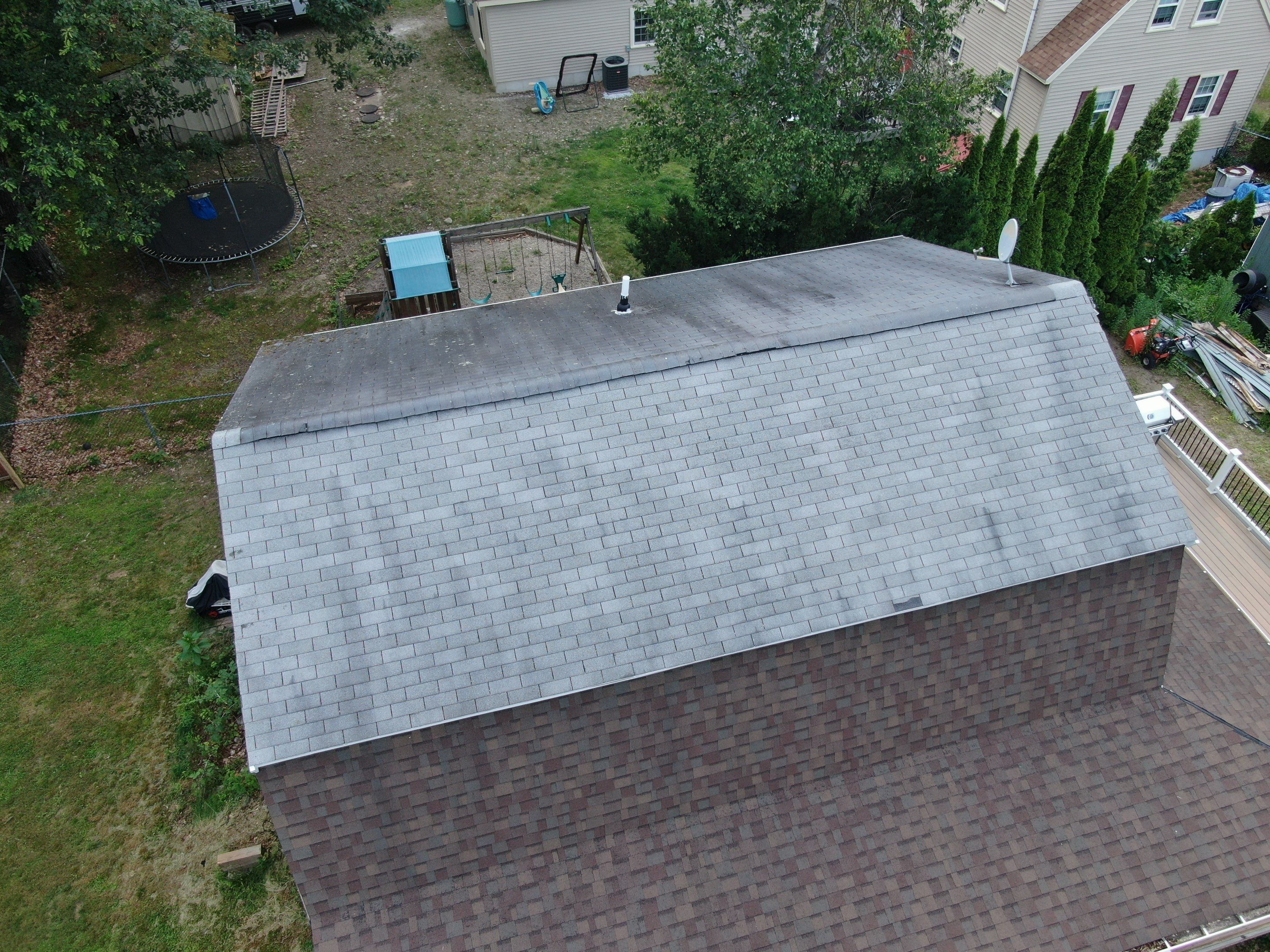 Full Roof Replacement & Farmers Porch Restoration – Asphalt + Standing Seam Metal by Mighty Dog Roofing of Greater Middlesex County