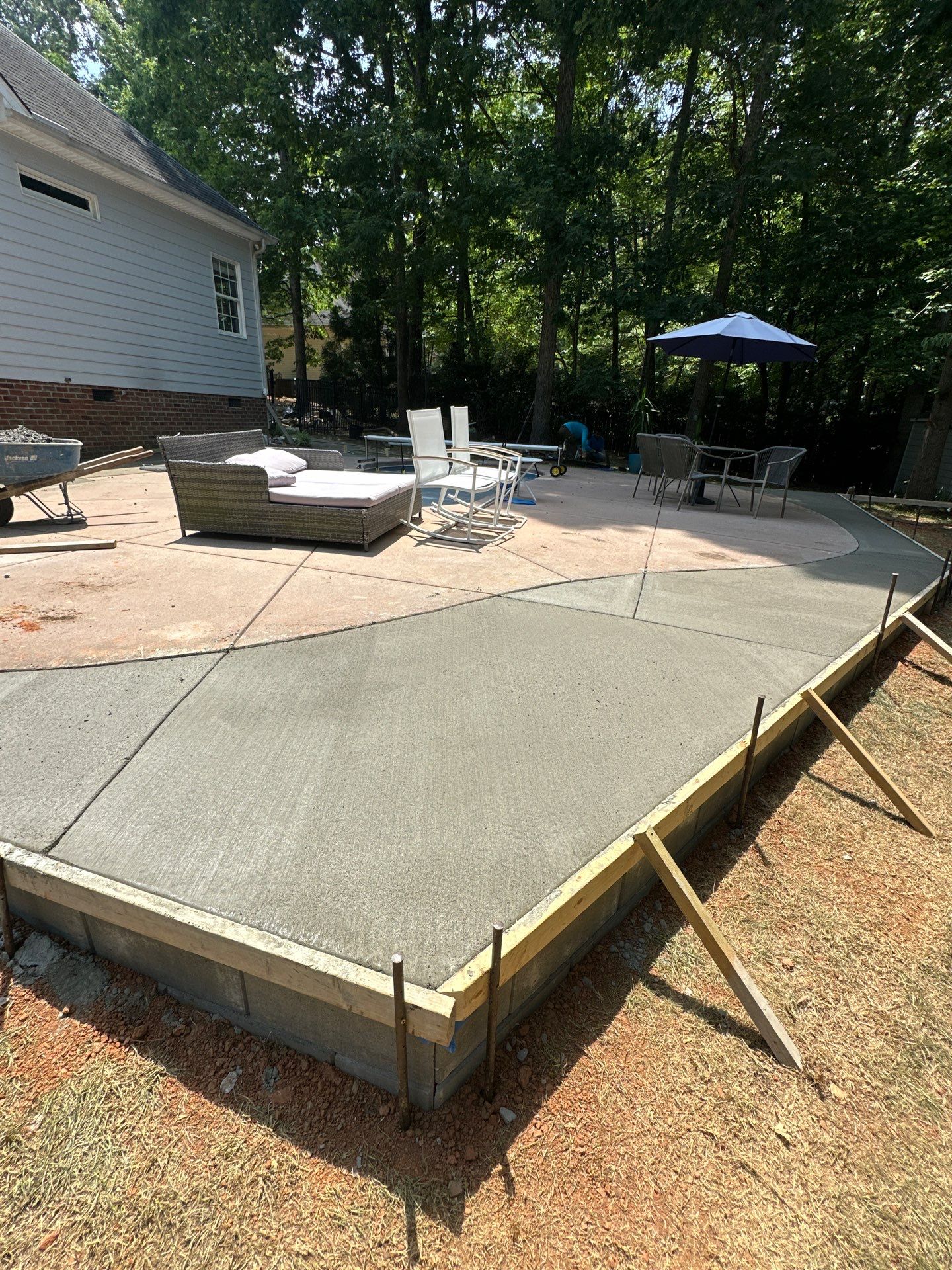 Cool decking pool in Youngsville by Martinez Brother’s Nc Landscaping Inc