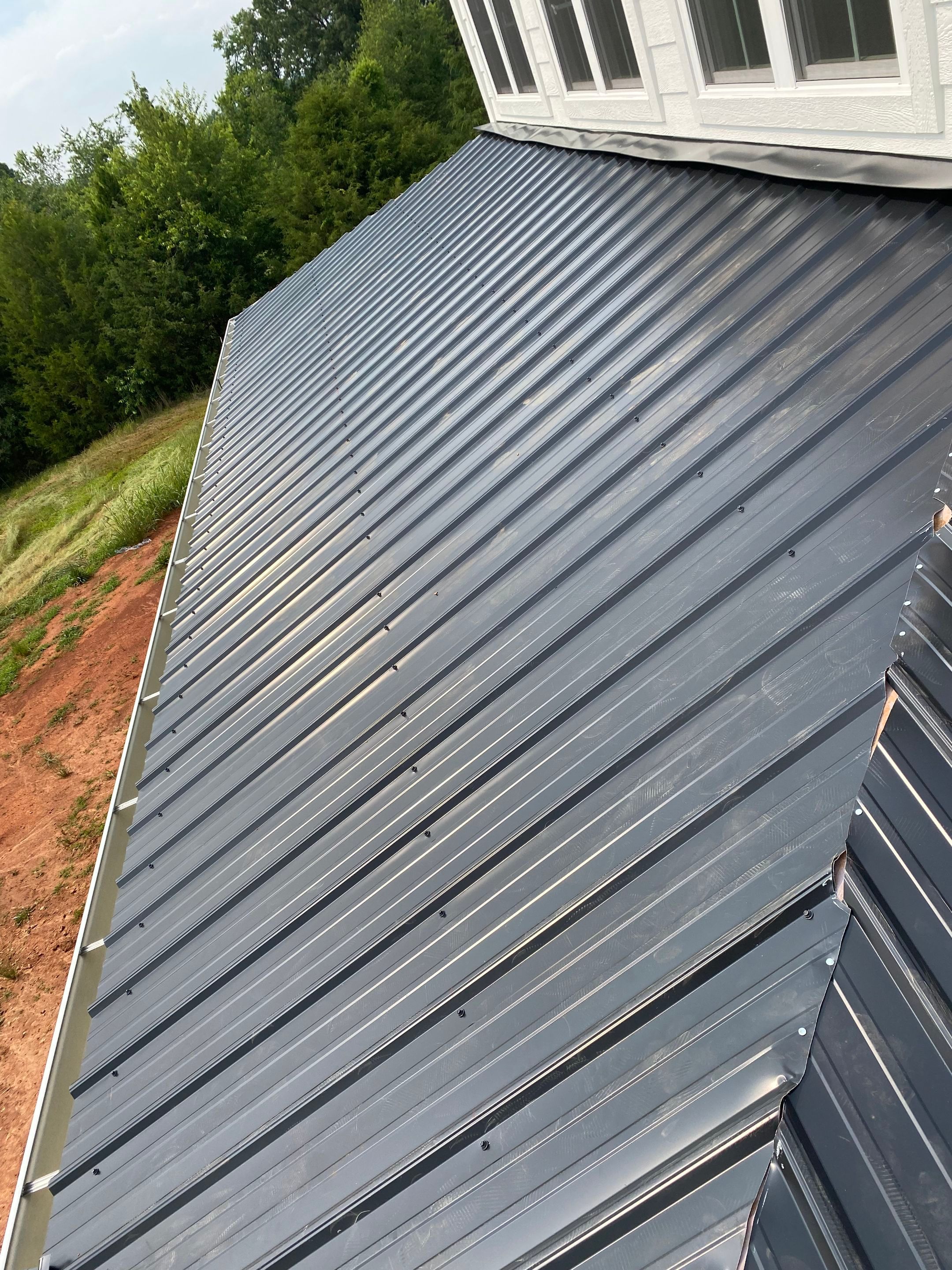 Jason's metal porch roof by BROCK BUILDERS 