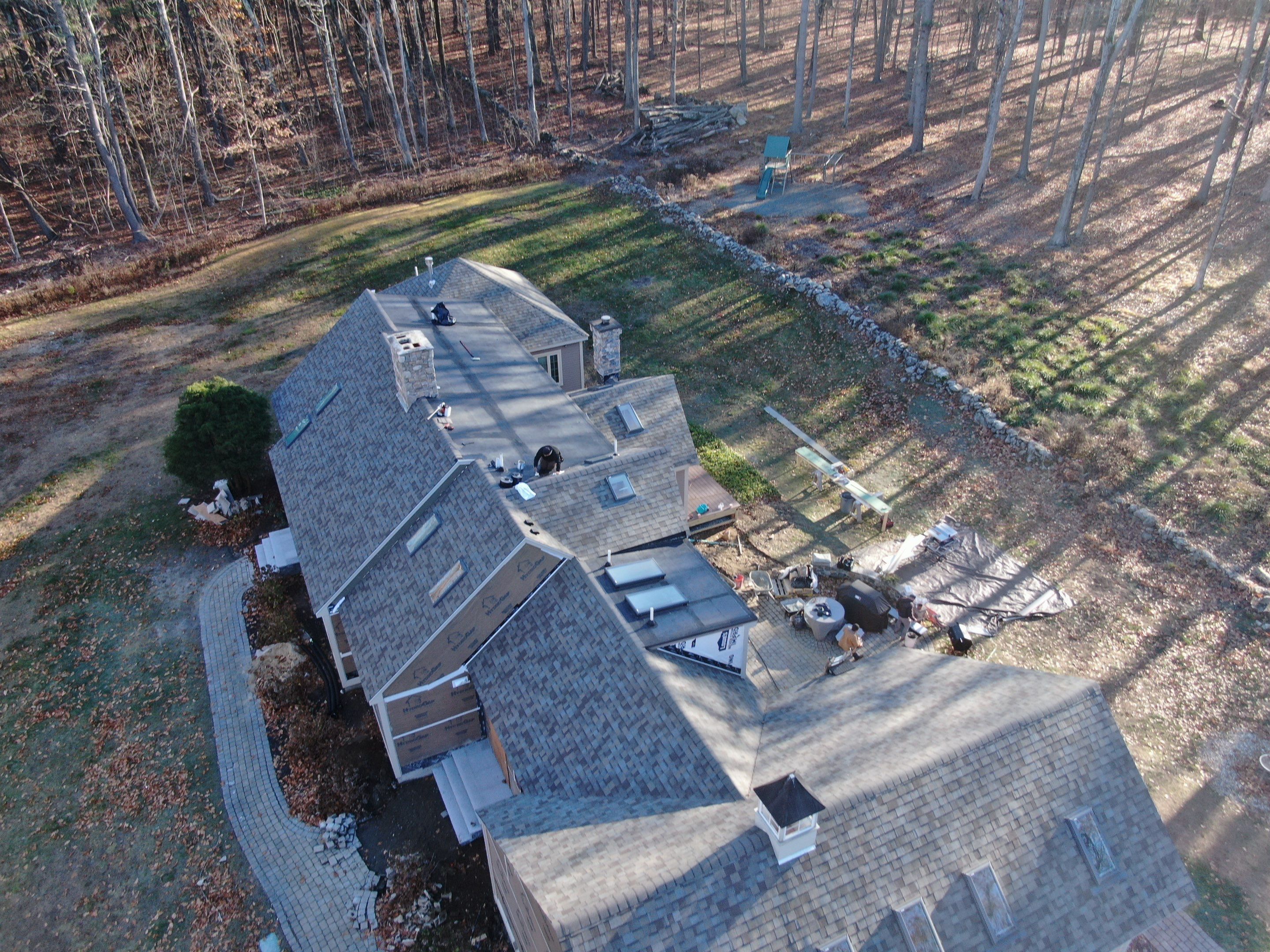 Complete House & Barn Roof with 13 Skylight Reflashing + EPDM Repairs by Mighty Dog Roofing of Greater Middlesex County