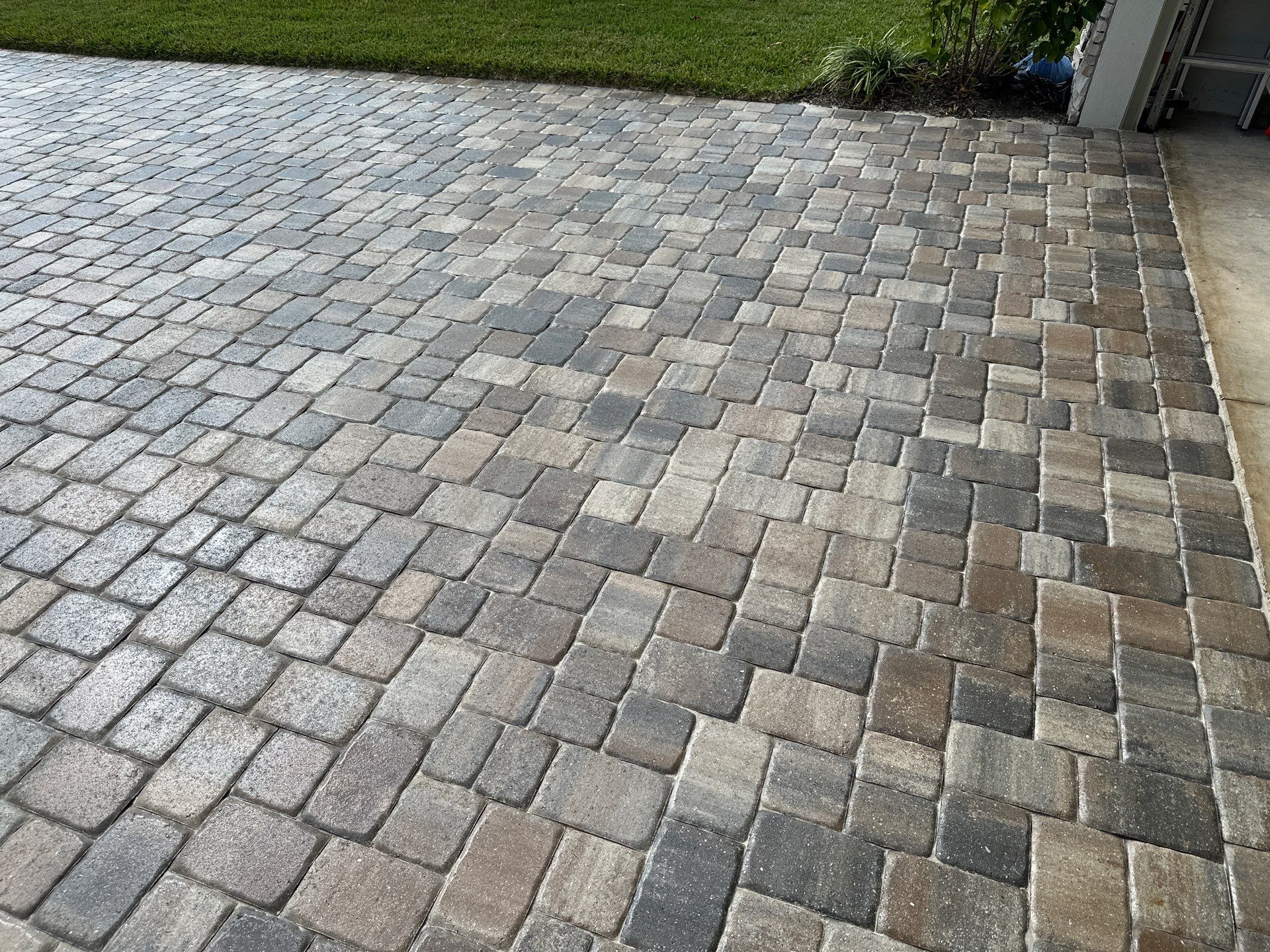 House Wash, Paver Driveway & Sidewalk Cleaning + Sanding & Sealing in Trevesta Community, Palmetto, FL by Sunshine AquaWash