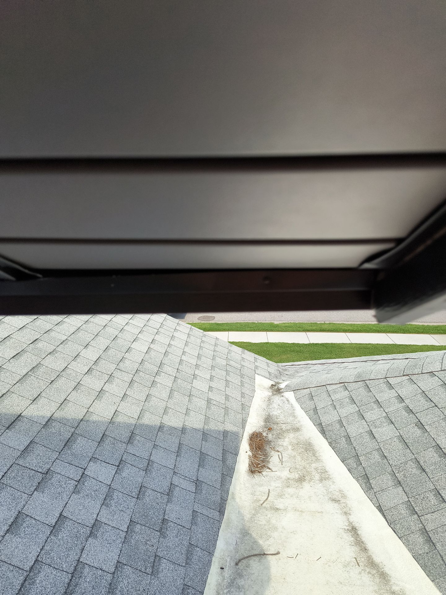 Black Seamless Gutters in Sarasota FL by Gutter Professors