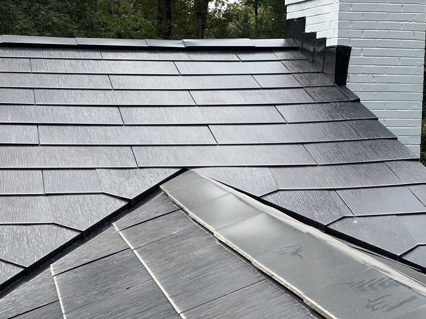 Tesla Solar Roof Replacement using Tesla Solar Roof V3 Tiles by American Home Contractors
