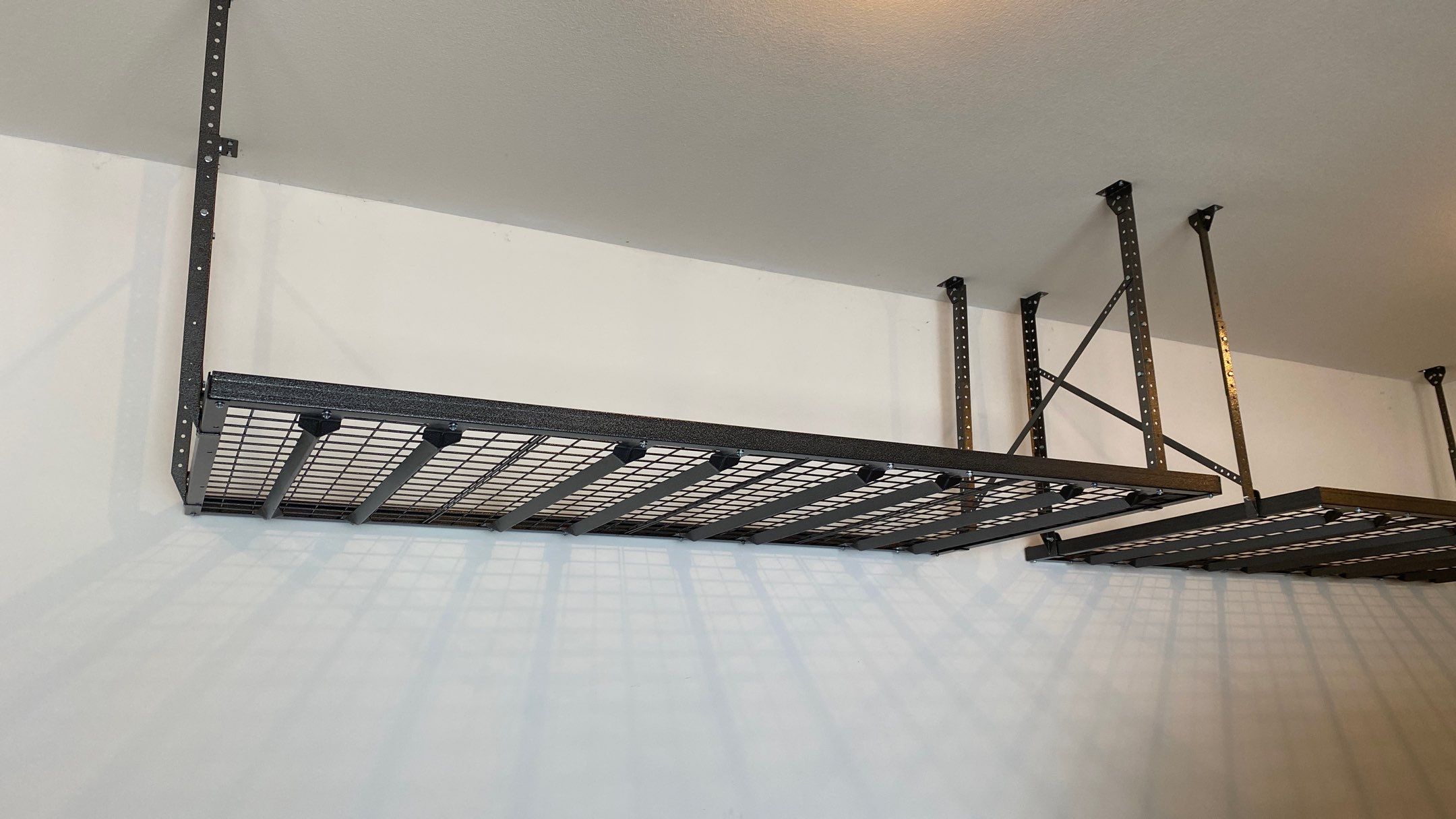 Rob T. adds a ceiling rack to his garage! by Banner Garage