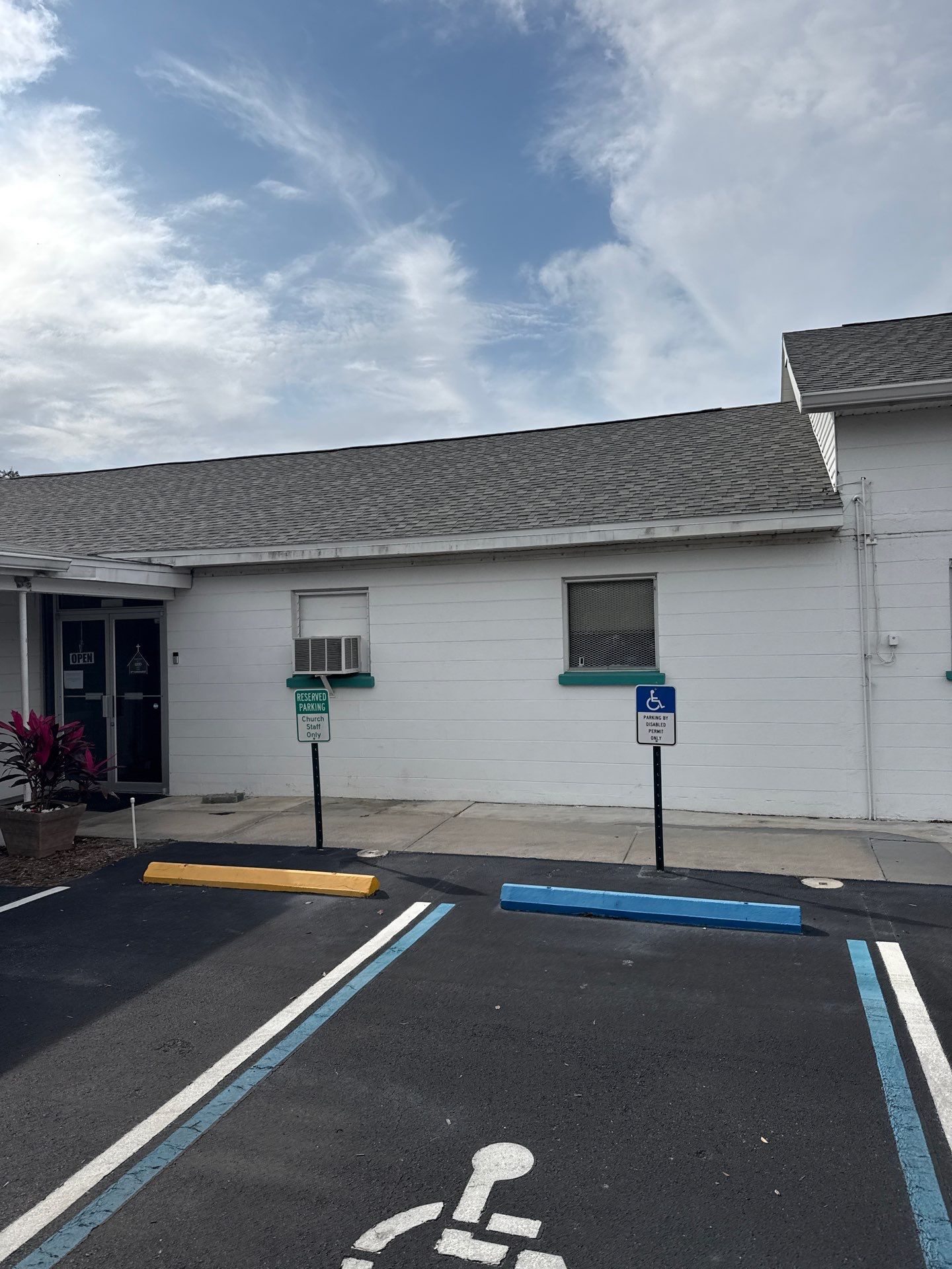 Downspout Installation using White Down Spouts in Sarasota FL by Gutter Professors