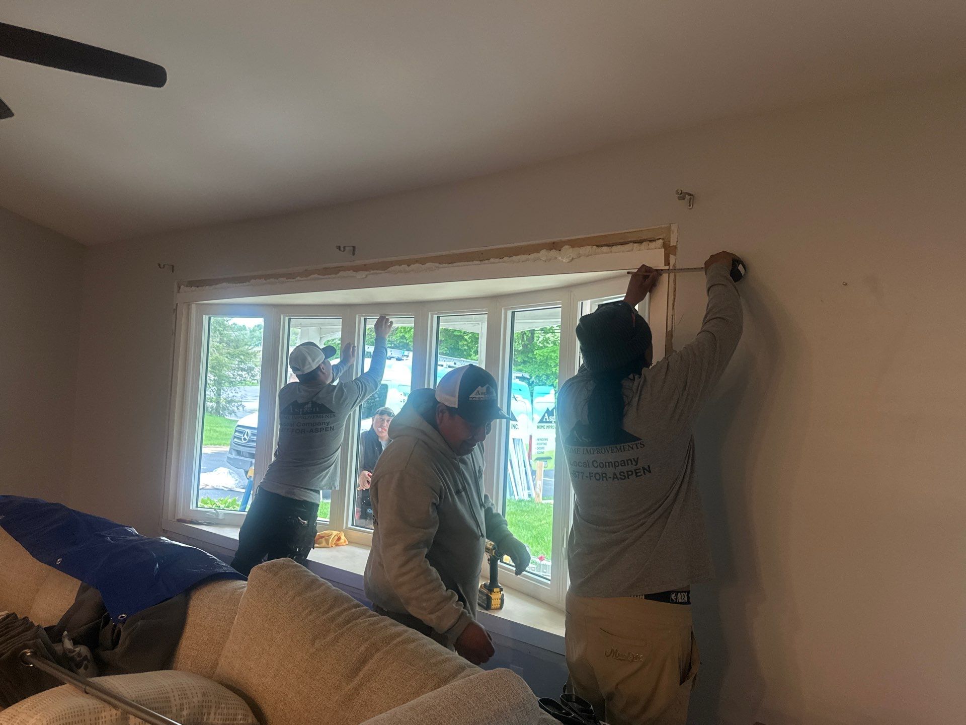 Double Hund Windows and Bow by Aspen Home Improvements