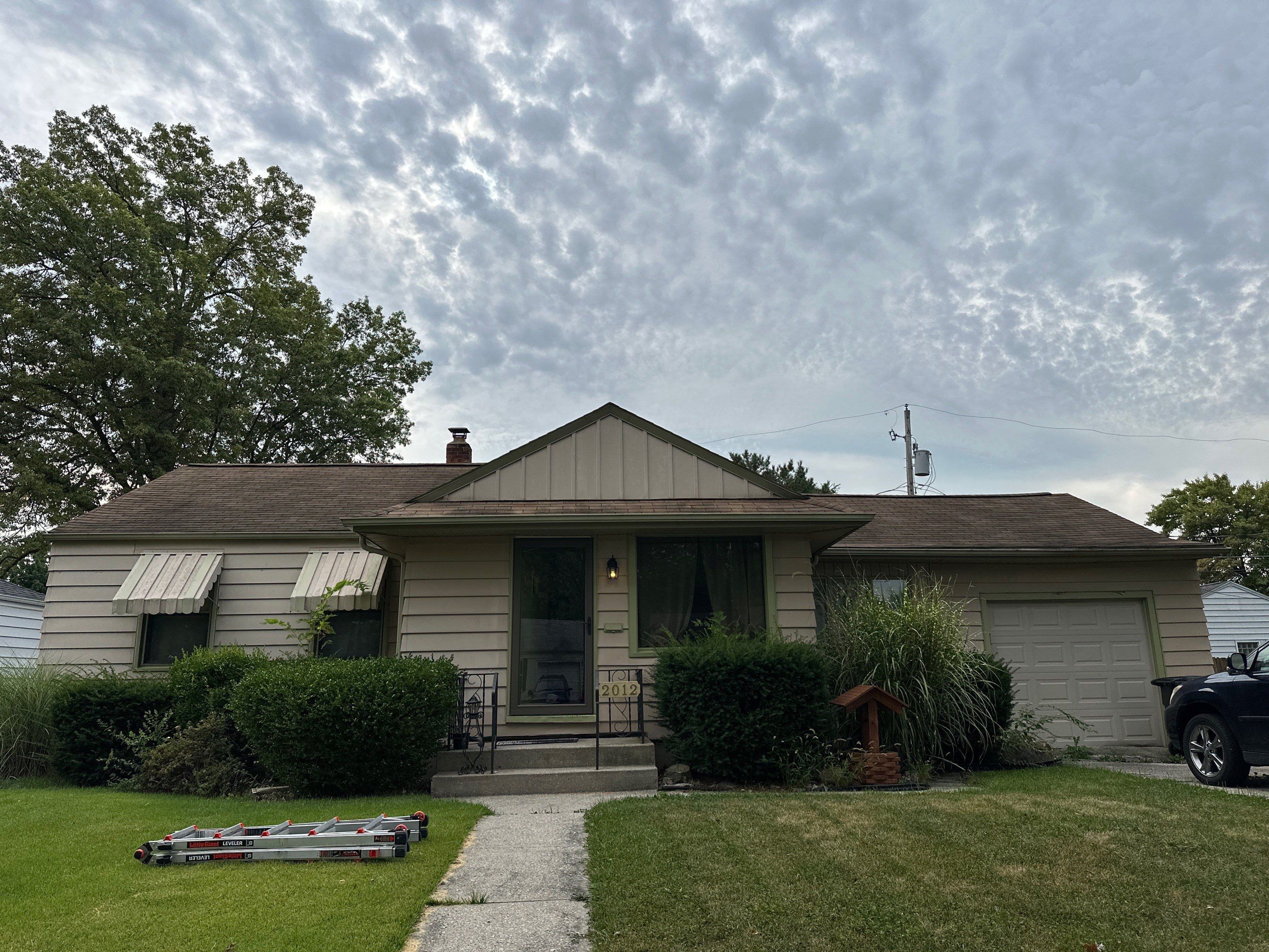Residential Roofing Installation using Exposed Fastener Metal Roof by 4Ever Metal Roofing