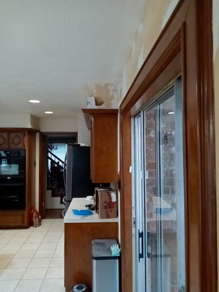 Interior and exterior painting project by Roof Concepts Construction