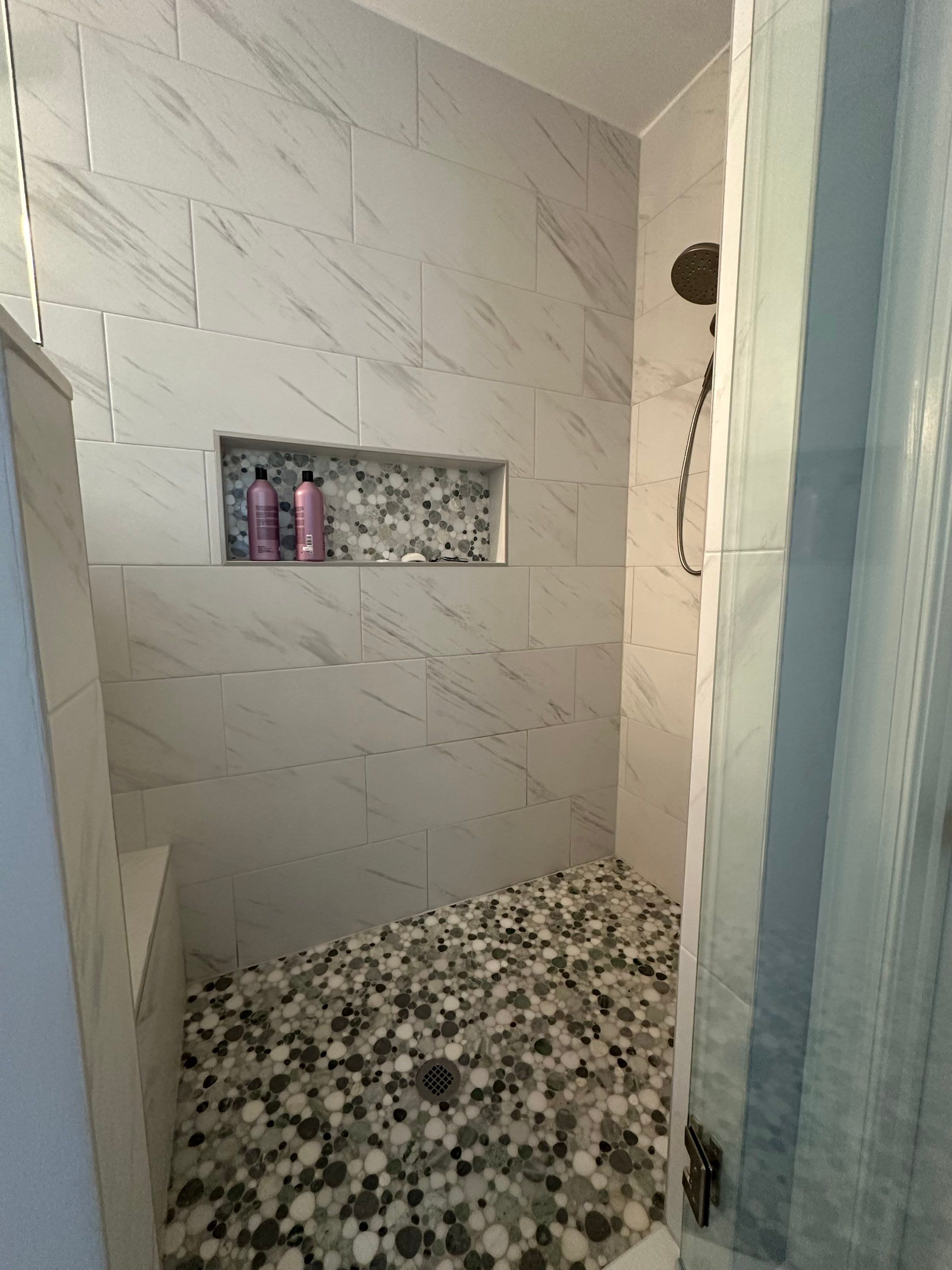 Bright Bathroom Remodel with Wall Removal, Stand Alone Tub and New Vanity by Footprints Floors of Coastal Carolina