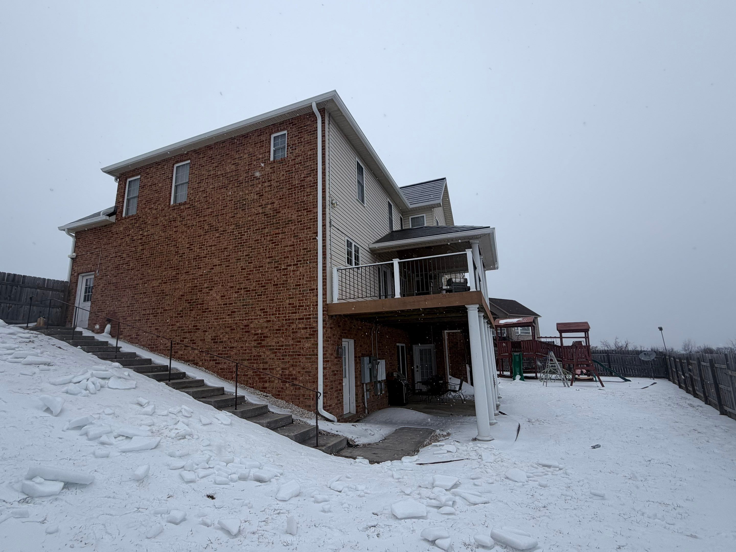 Winter Tesla Solar Roof Installation! by American Home Contractors