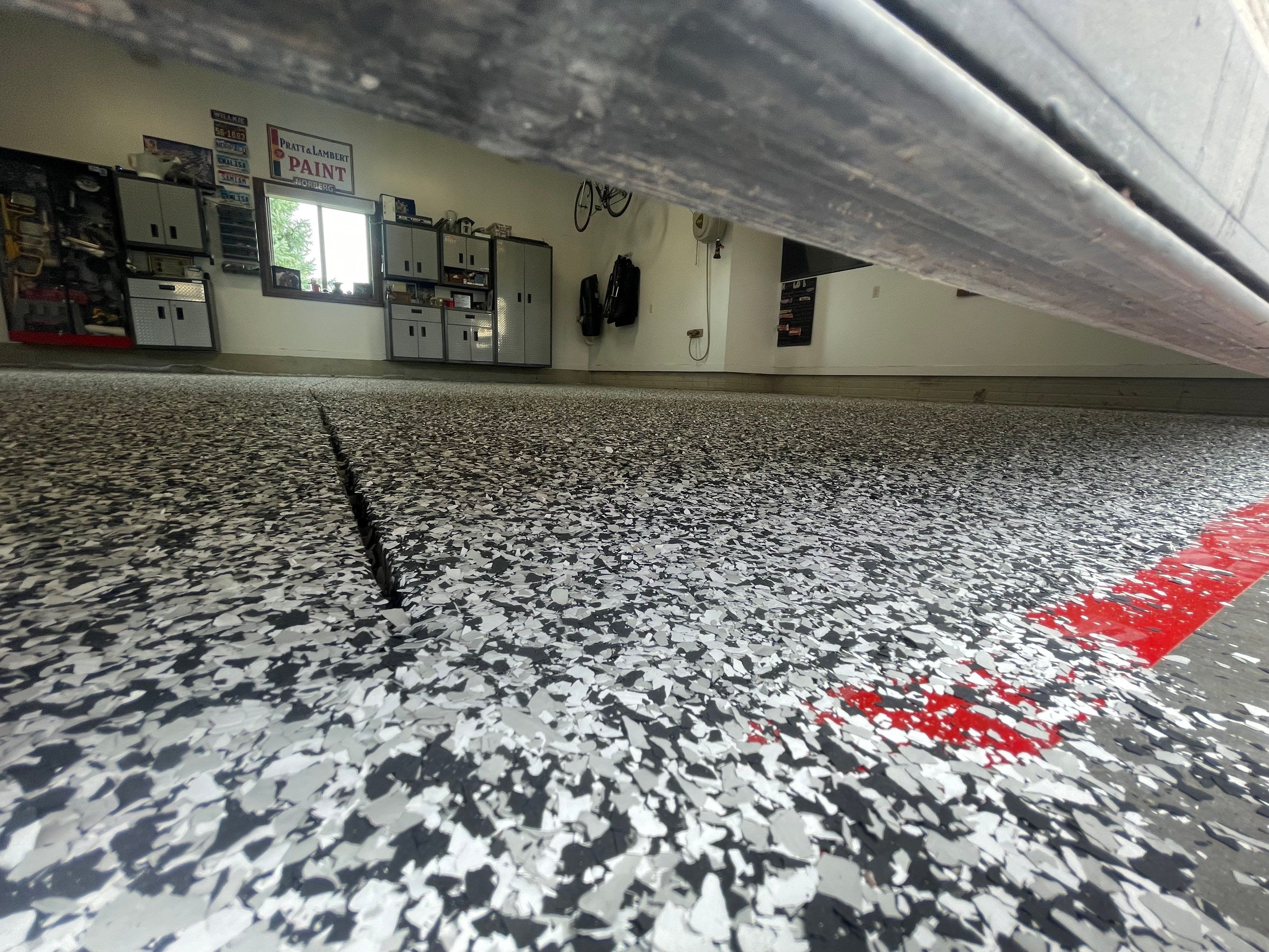 Garage Floor Coating and Domino Flake Finish in Sioux Falls by Select Painting, Coatings & Garage Cabinets