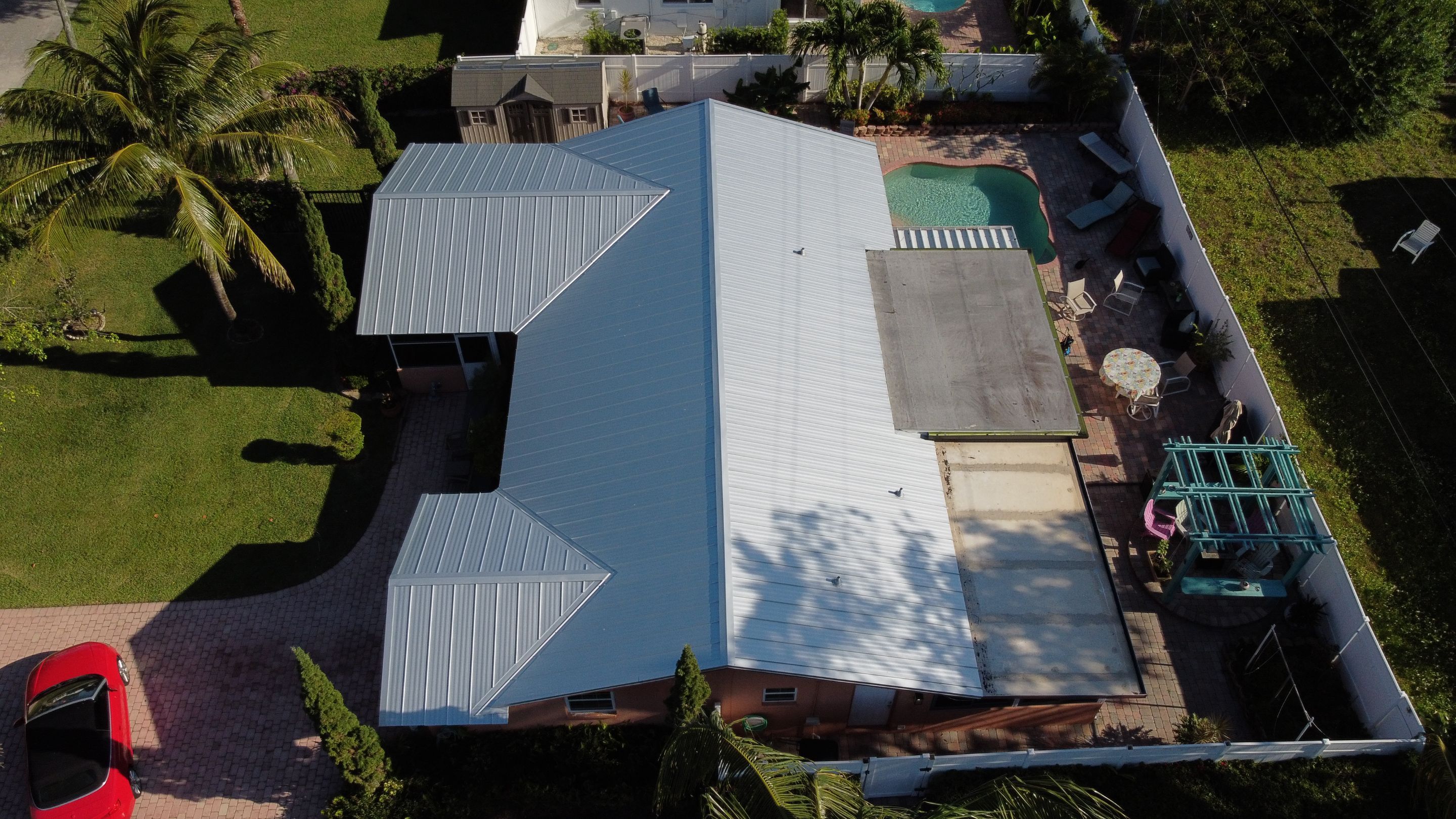 Residential Roofing Installation using 1" Nail strip metal roof by BLUES BROTHERS CONSTRUCTION CORP