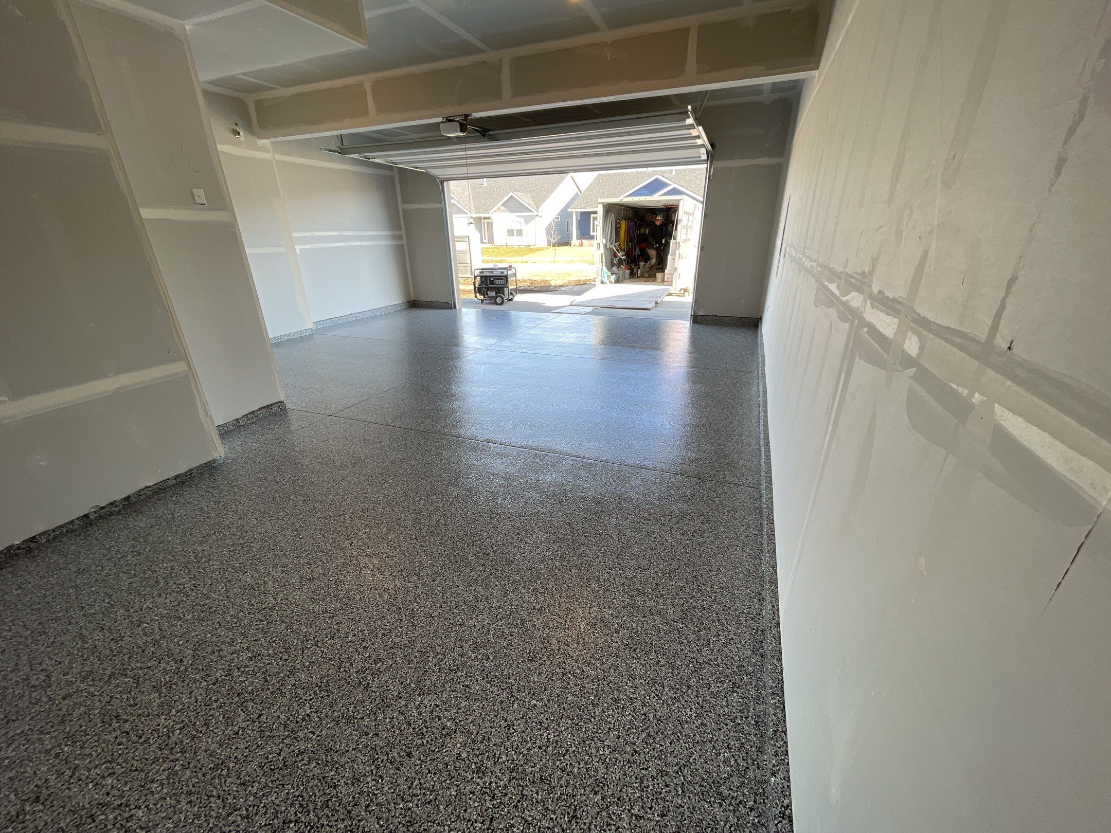 Garage Transformation using Domino by Croc Coatings, LLC