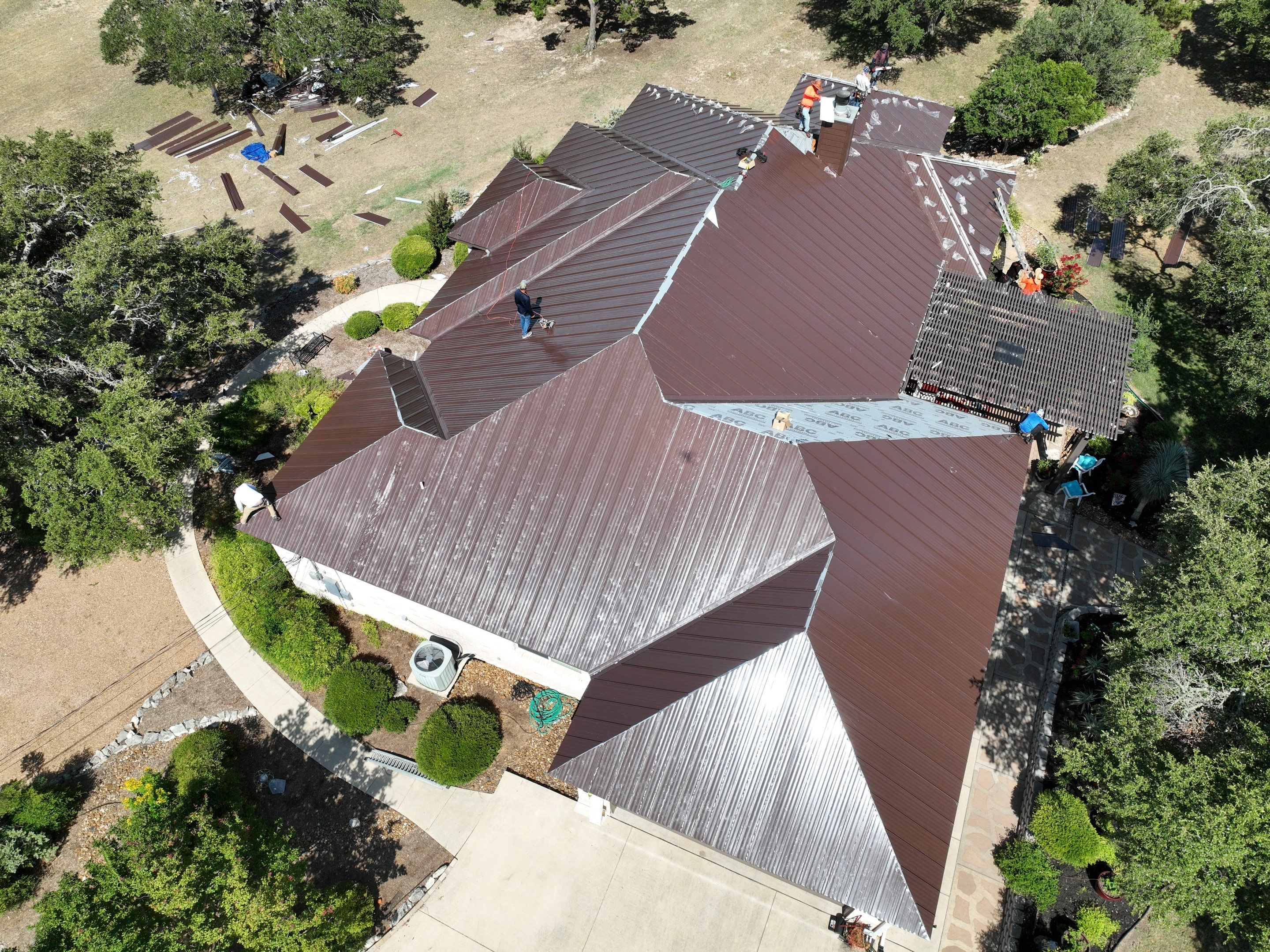 Residential Metal Roof Installation using McElroy Metal by Premier Roofing and Contracting