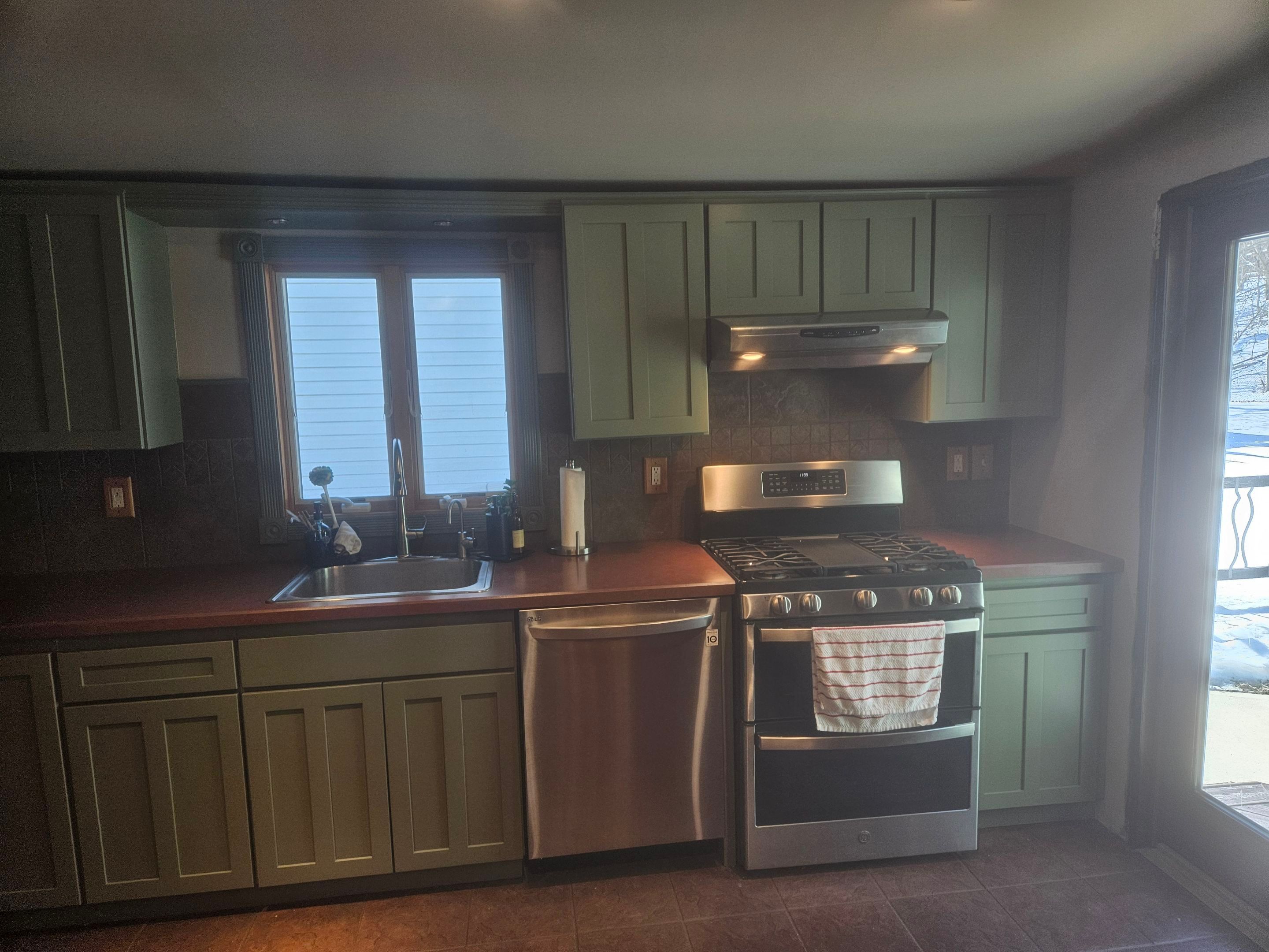 Cabinet Refinishing using Benjamin Moore Command Satin by Spectrum Painting, LLC