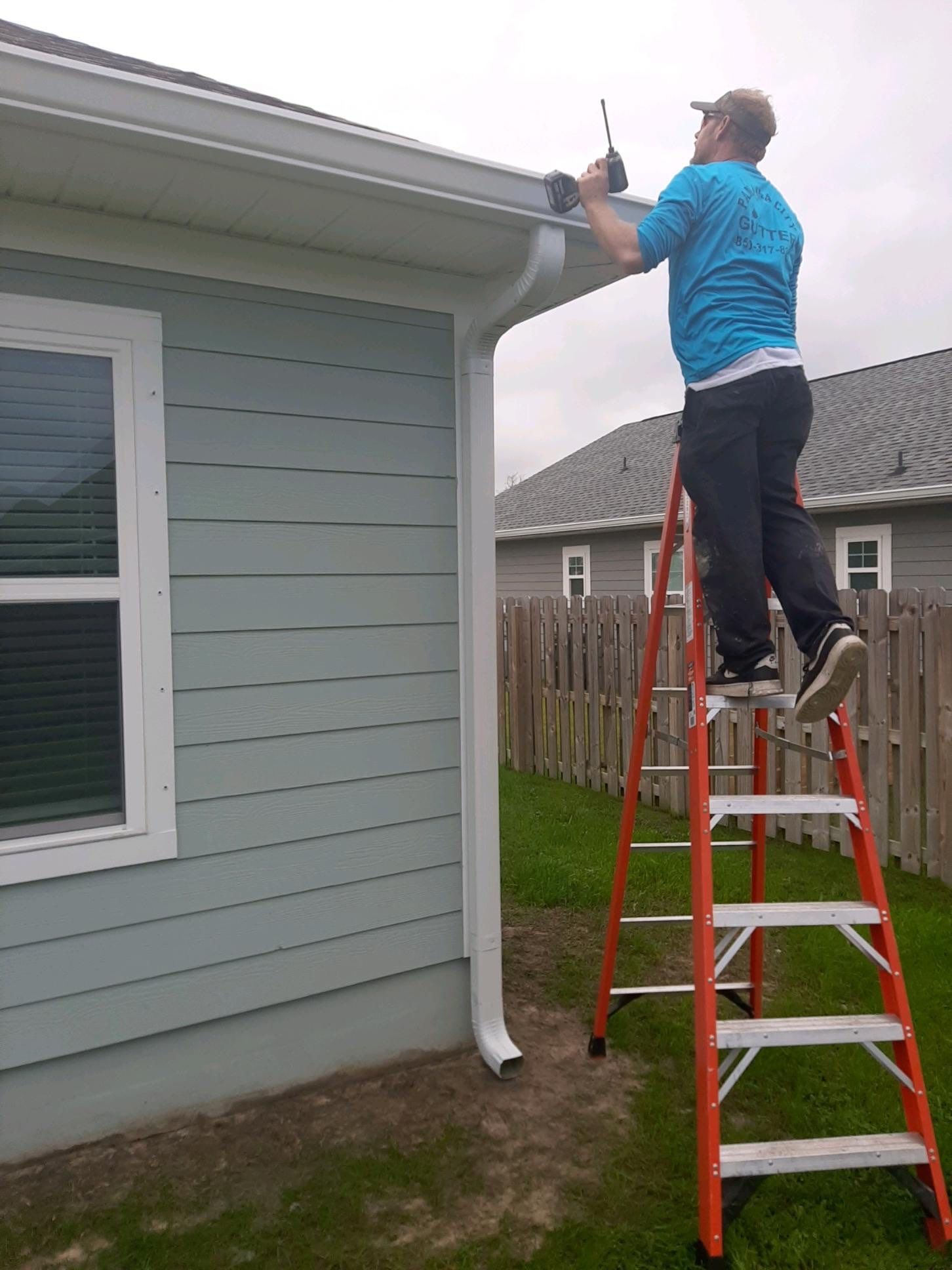 Gutter Installation Using White K-Style Seamless Gutters by Gutter Professors