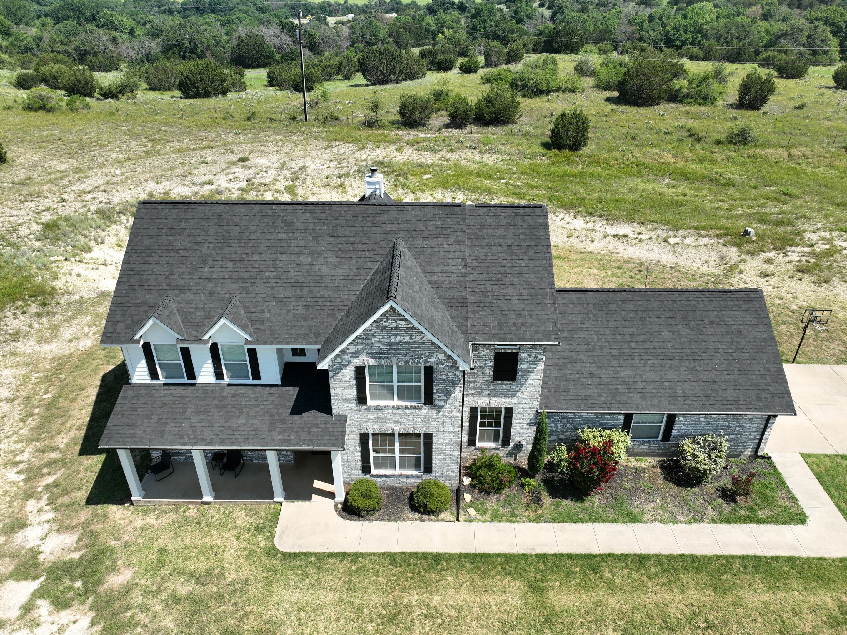 Residential Roofing Installation using Malarkey Highlander Brilliant Black by OneSource Roofing and Restoration