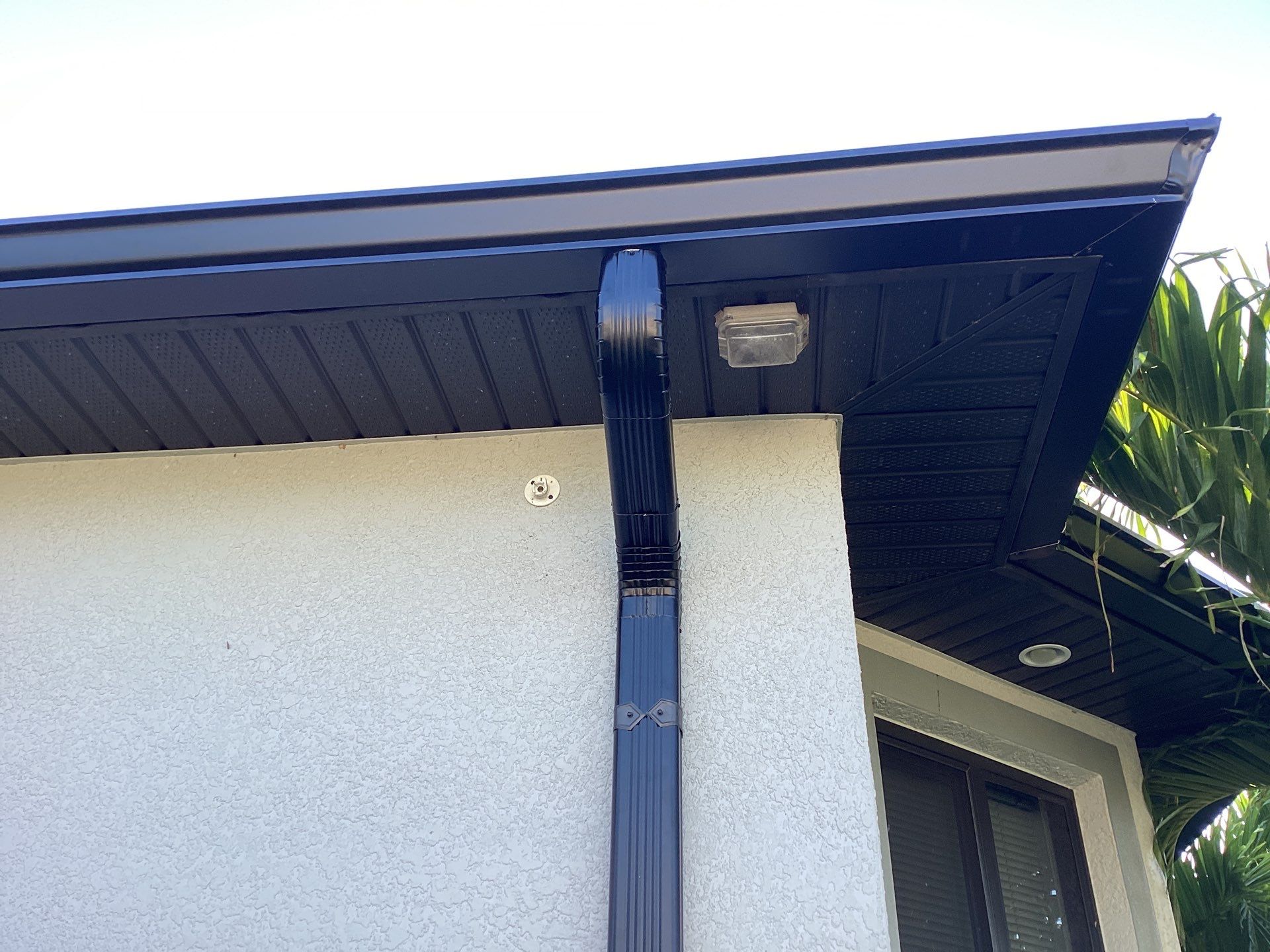 Black Seamless Gutters using 6 Inch Seamless Gutters in Cape Coral FL by Gutter Professors