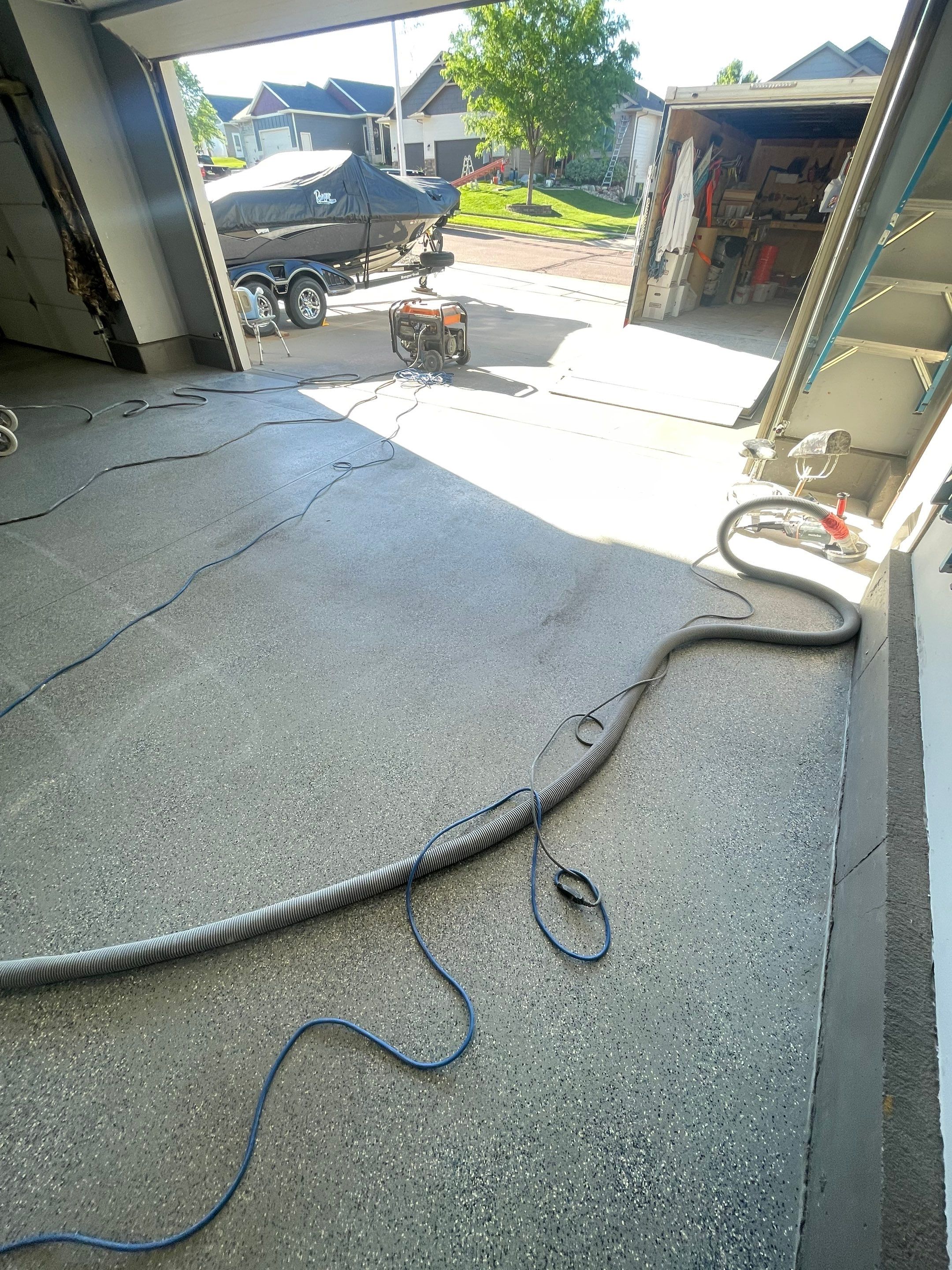 Residential Garage Floor Coating in Sioux Falls by Select Painting, Coatings & Garage Cabinets