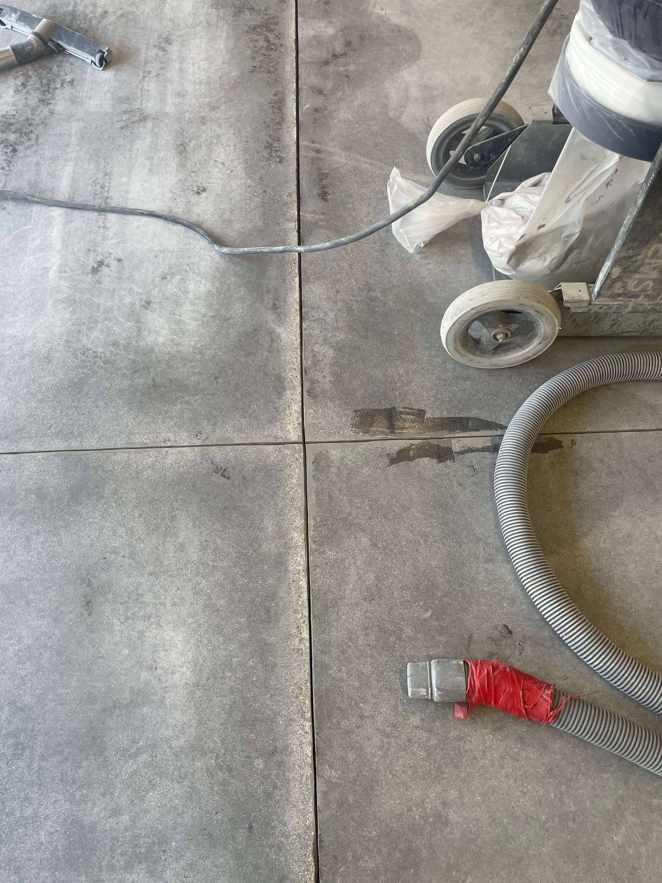 Multi-Stall Garage Floor Coating Installation in Sioux Falls by Select Painting, Coatings & Garage Cabinets