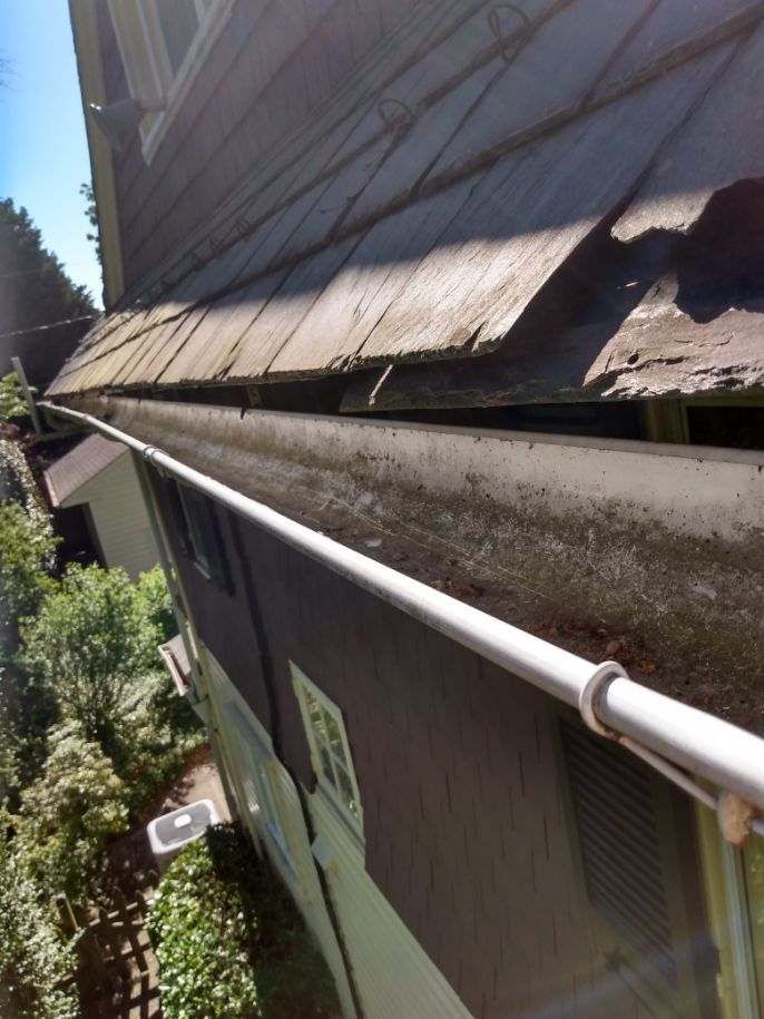 Slate Roof Repair & Gutter Cleaning in Roland Park by Roof Right Inc