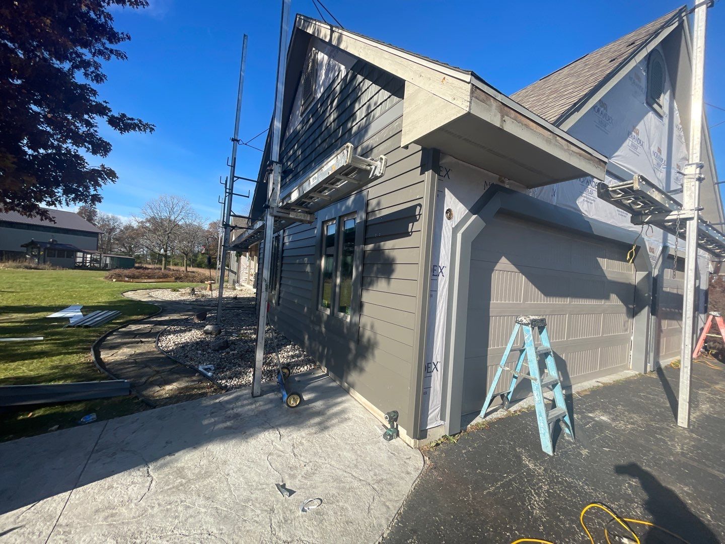 Siding Installation using Norandex Polar Wall Plus Siding, Window Wraps by Total Exteriors