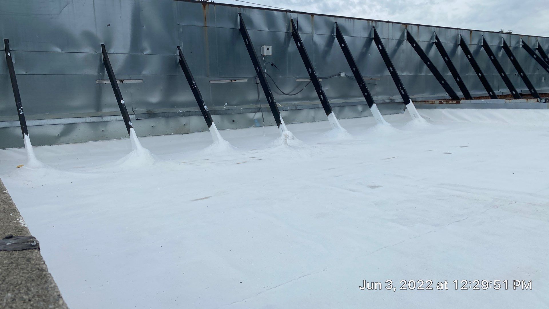 Commercial Roof Coating using Fiberseal basecoat and Silicon Topcoat by Just In Time Roofing and Restoration