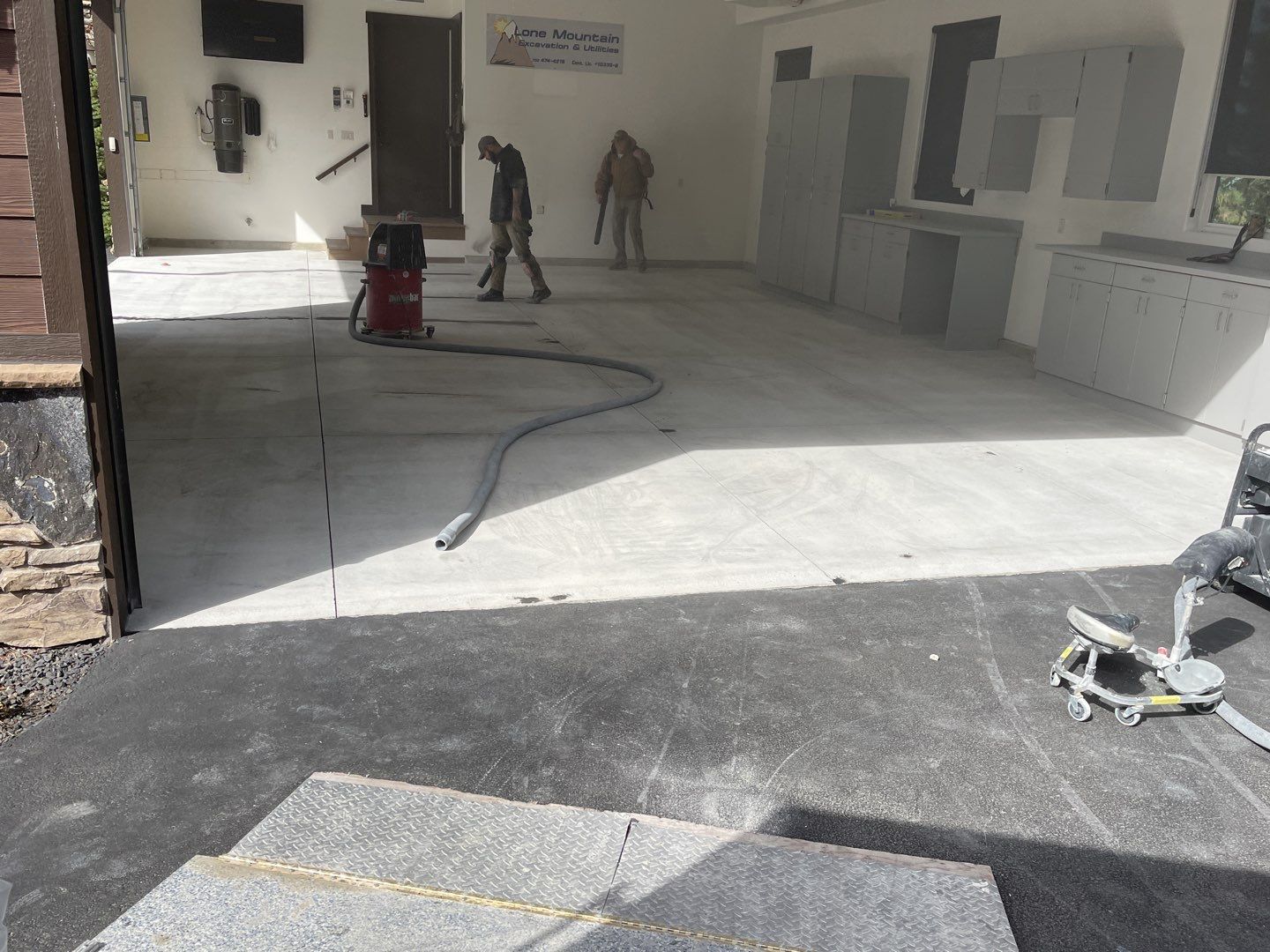 Garage Transformation using Smoke and the Penntek Evolution System by Croc Coatings, LLC