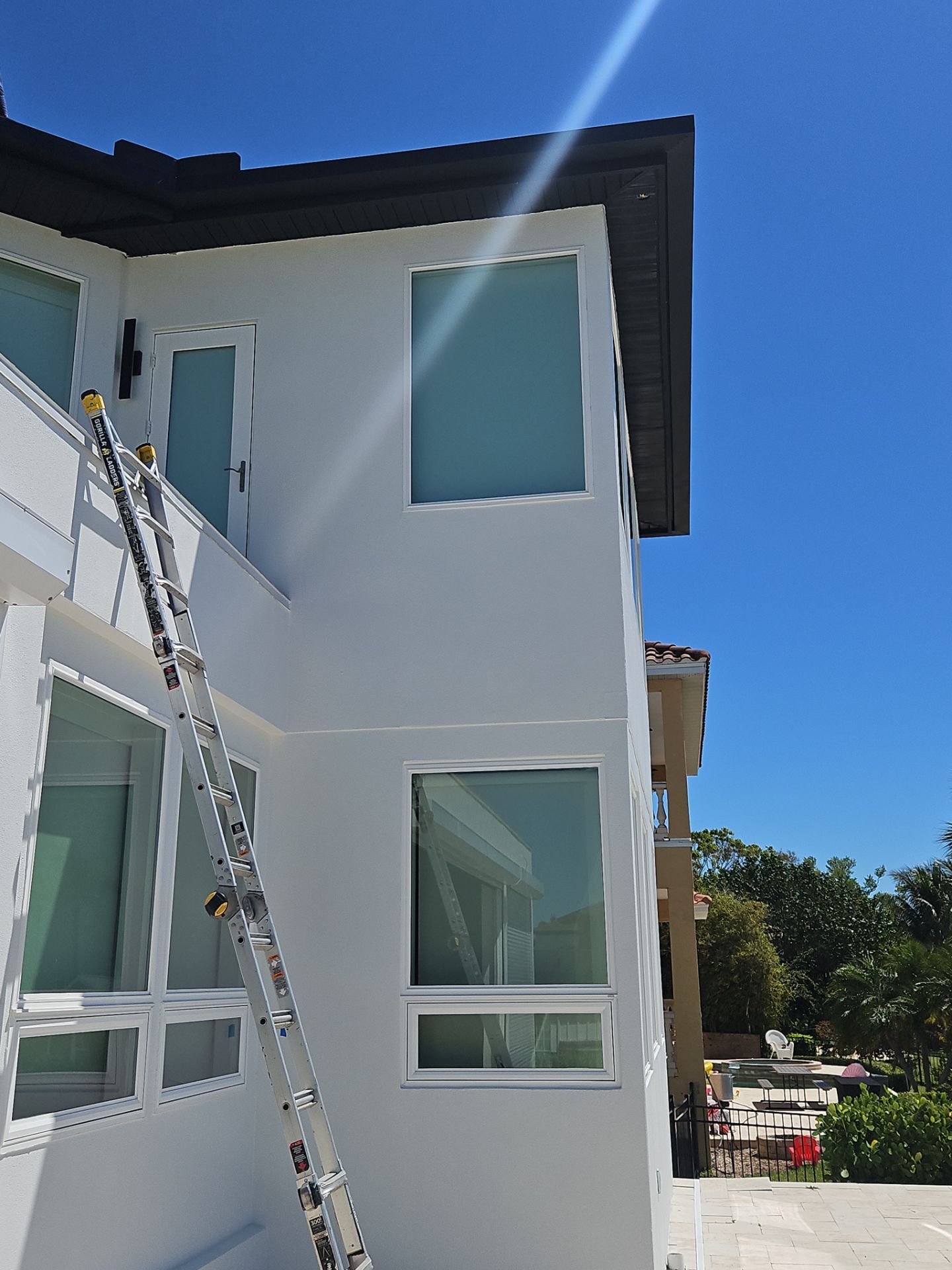 Soffit and Fascia Installation and black seamless gutters in Sarasota FL by Gutter Professors
