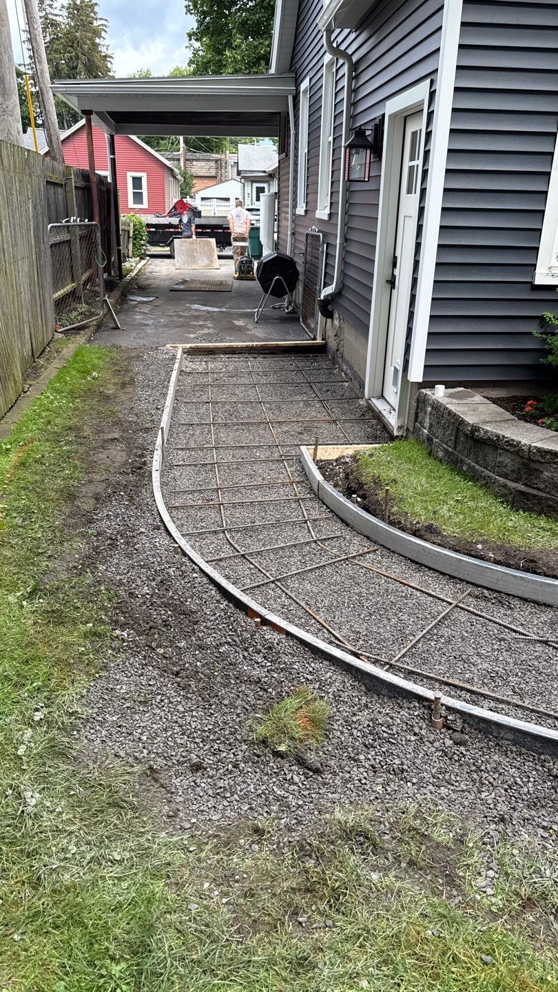 Oxford slate stamped patio and walkway  by NG Masonry & Construction LLC