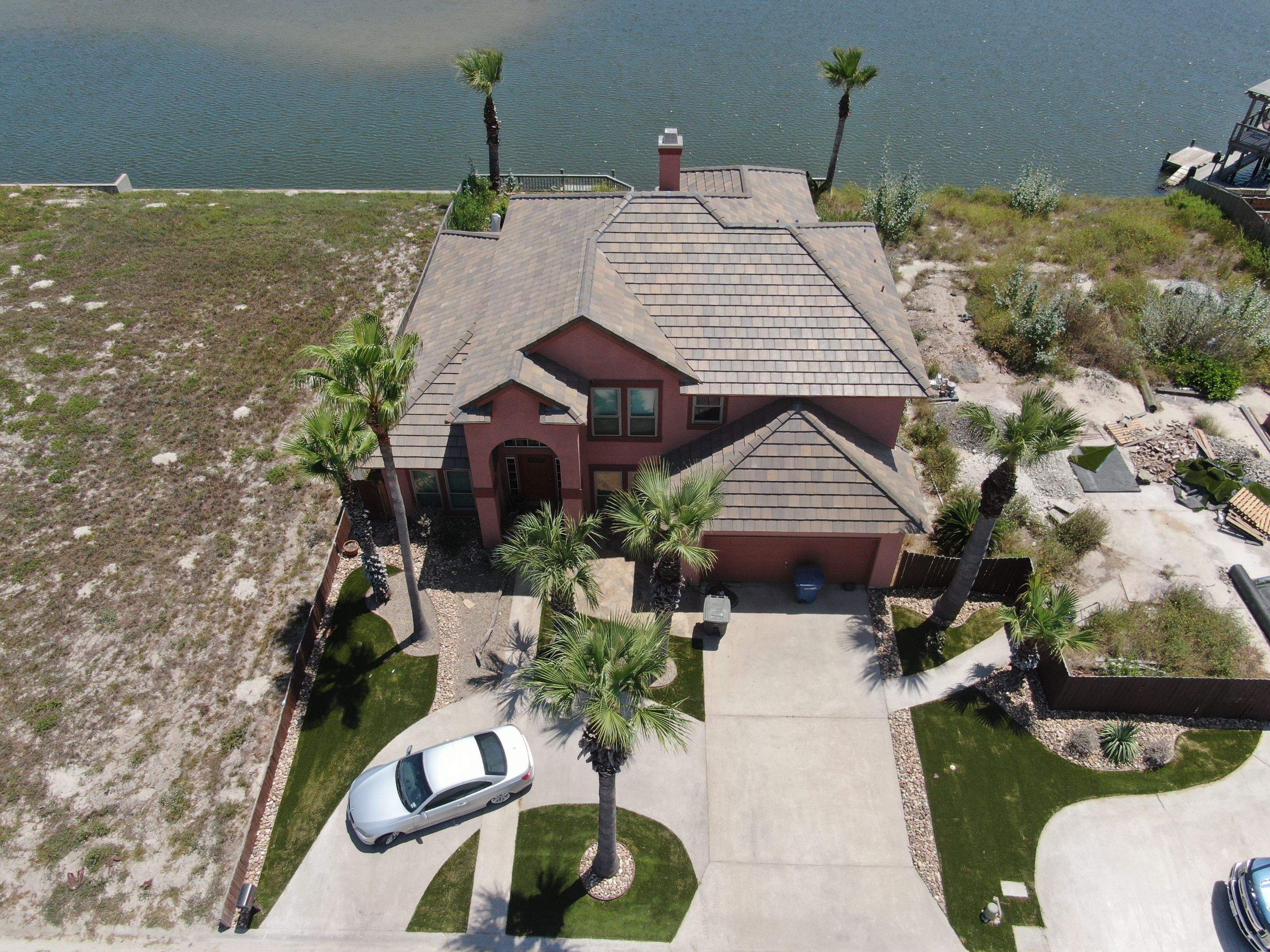 Busted to Beautiful! by Bayfront Roofing and Construction