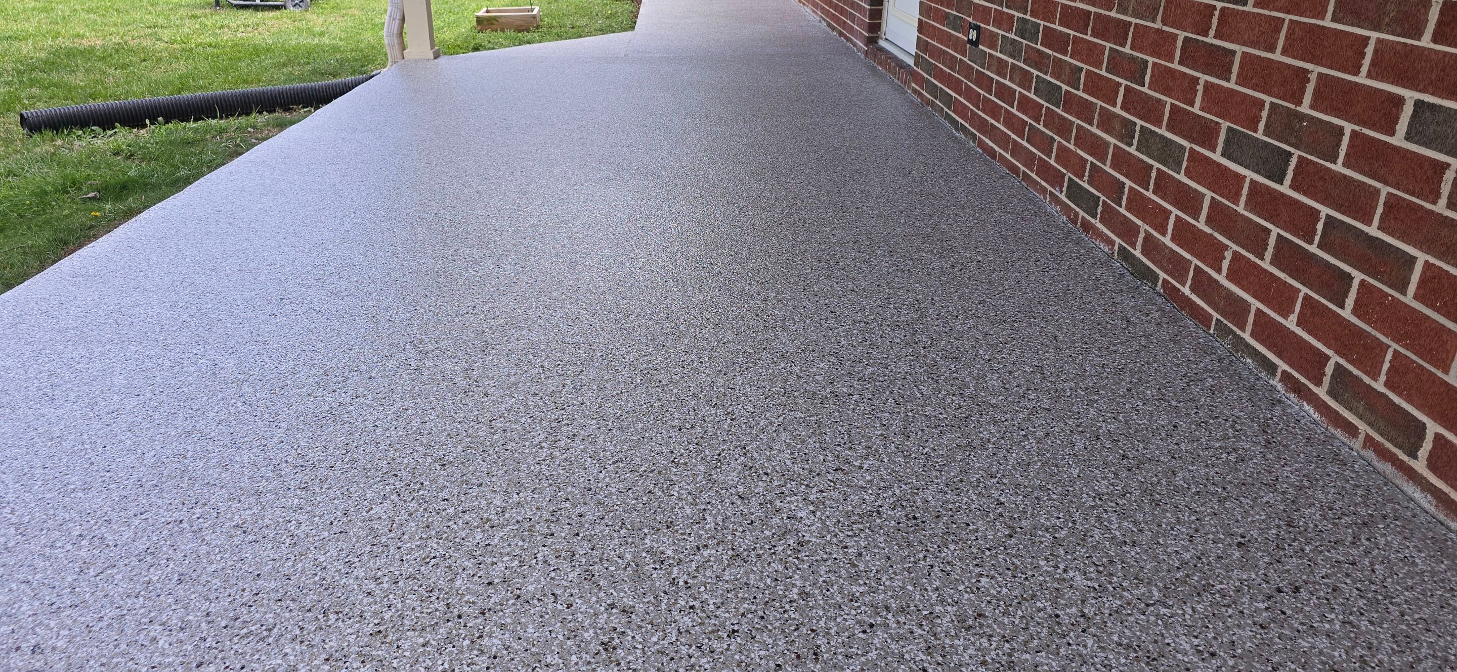 Back Patio using Creekbed by Elite Floor Solutions