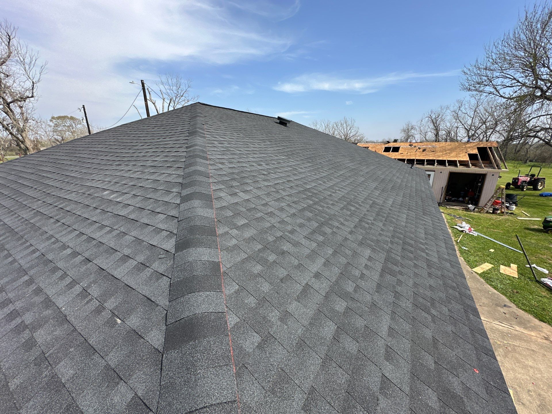 Residential Roofing Installation using GAF Timberline Night Shadow (NS) by Motion Roofing