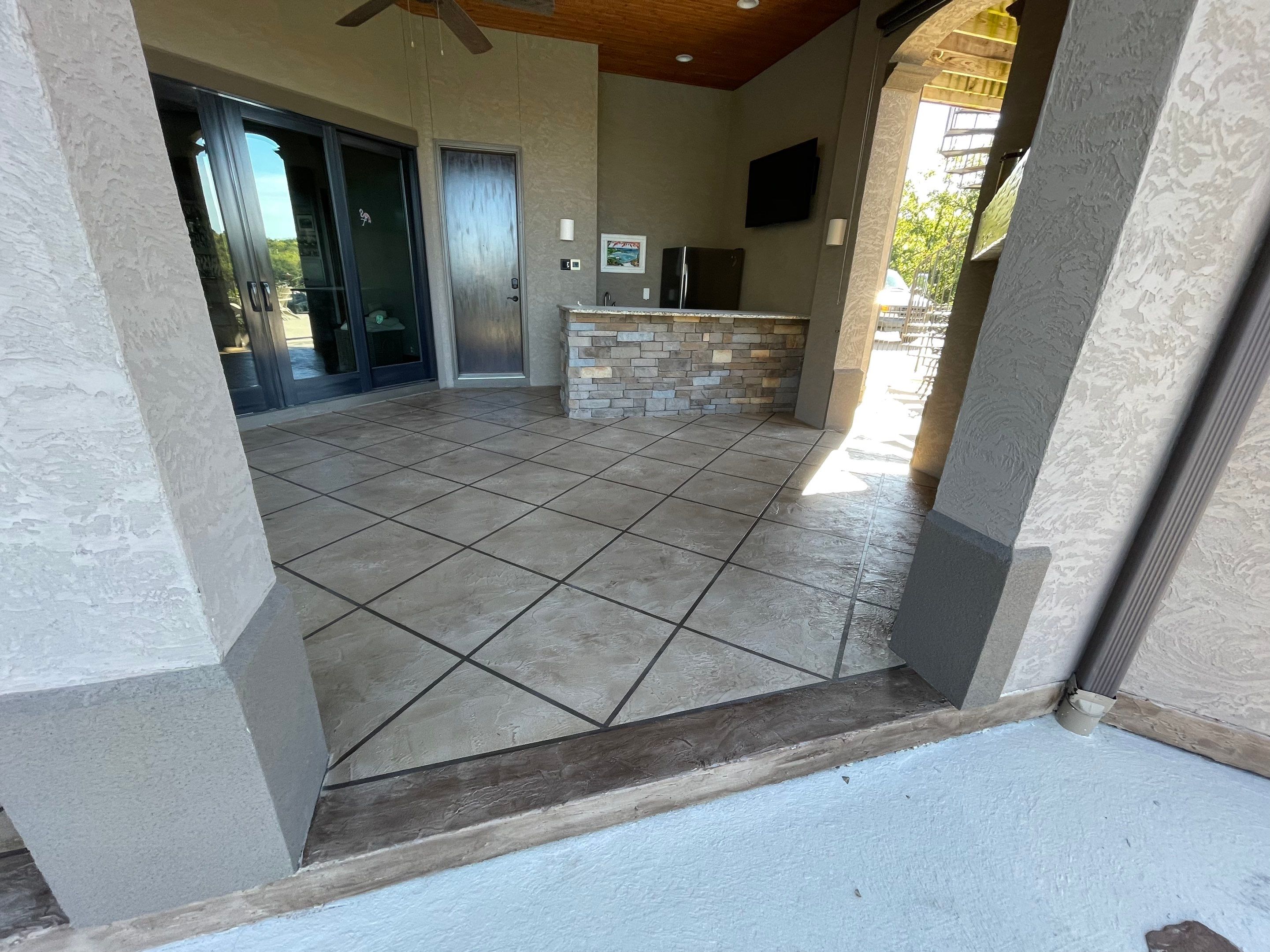 Lake Lotawana -- Front Walkway and Back Patio Tuscan Overlay by Big Red Decorative Concrete, LLC