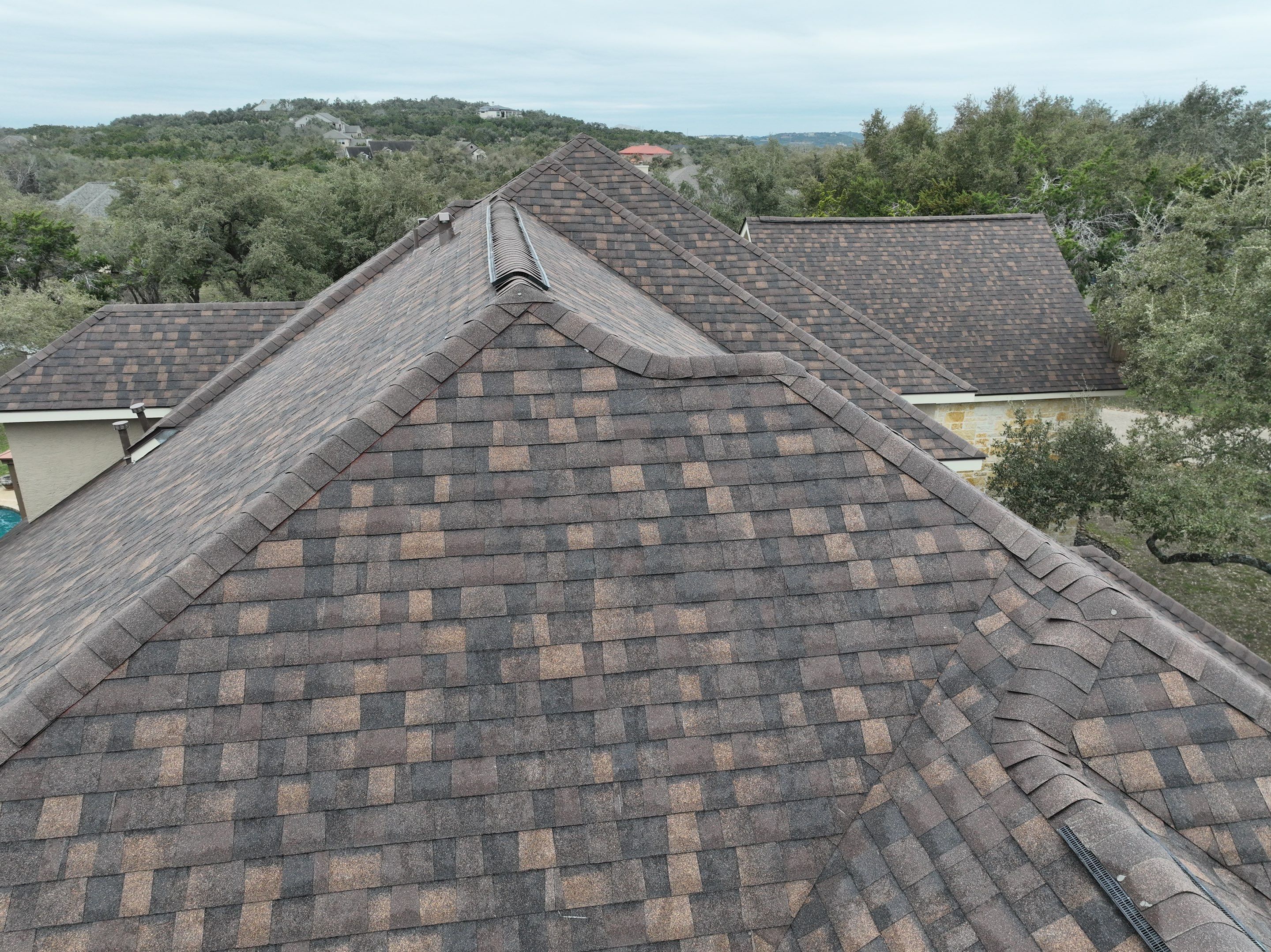 Residential Roof Replacement using 30 Year Laminate Shingles with High Profile Ridge by Premier Roofing and Contracting