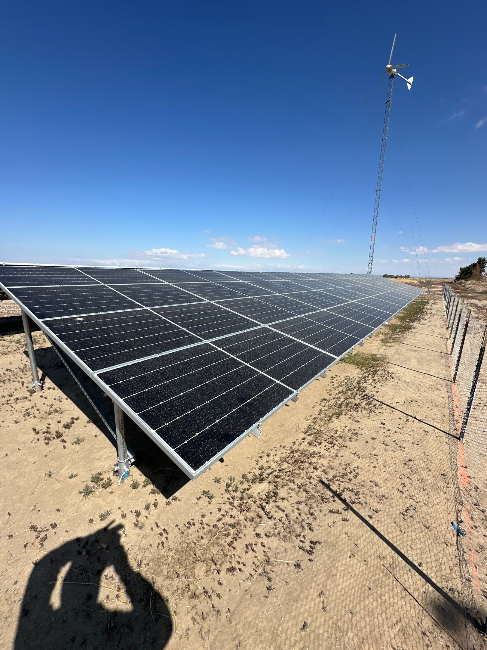 Large-Scale Ground-Mount Solar and Tesla Powerwall Battery Installation by AWS Solar