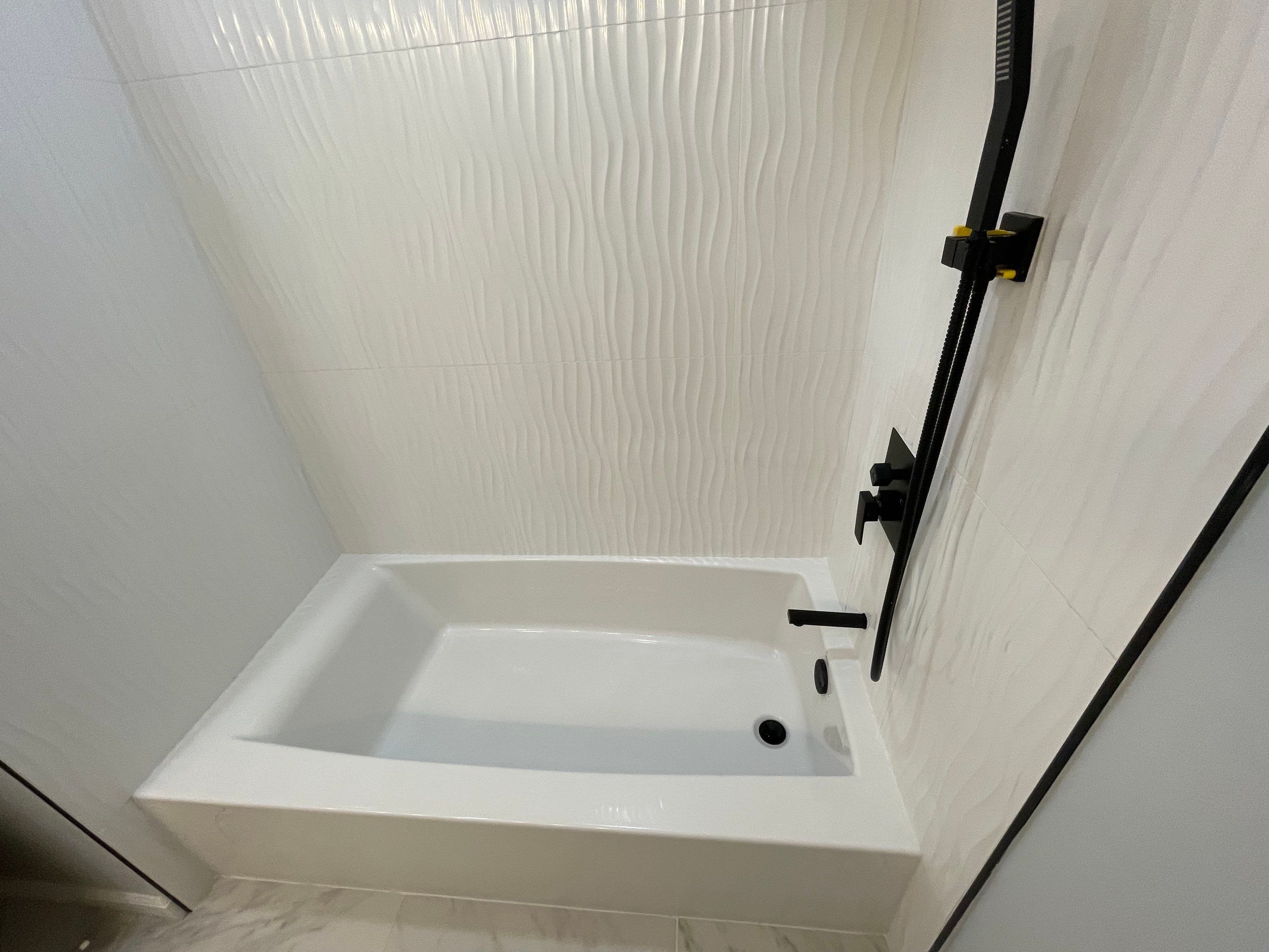 Bathroom Remodel using Tile by Home Concepts Construction
