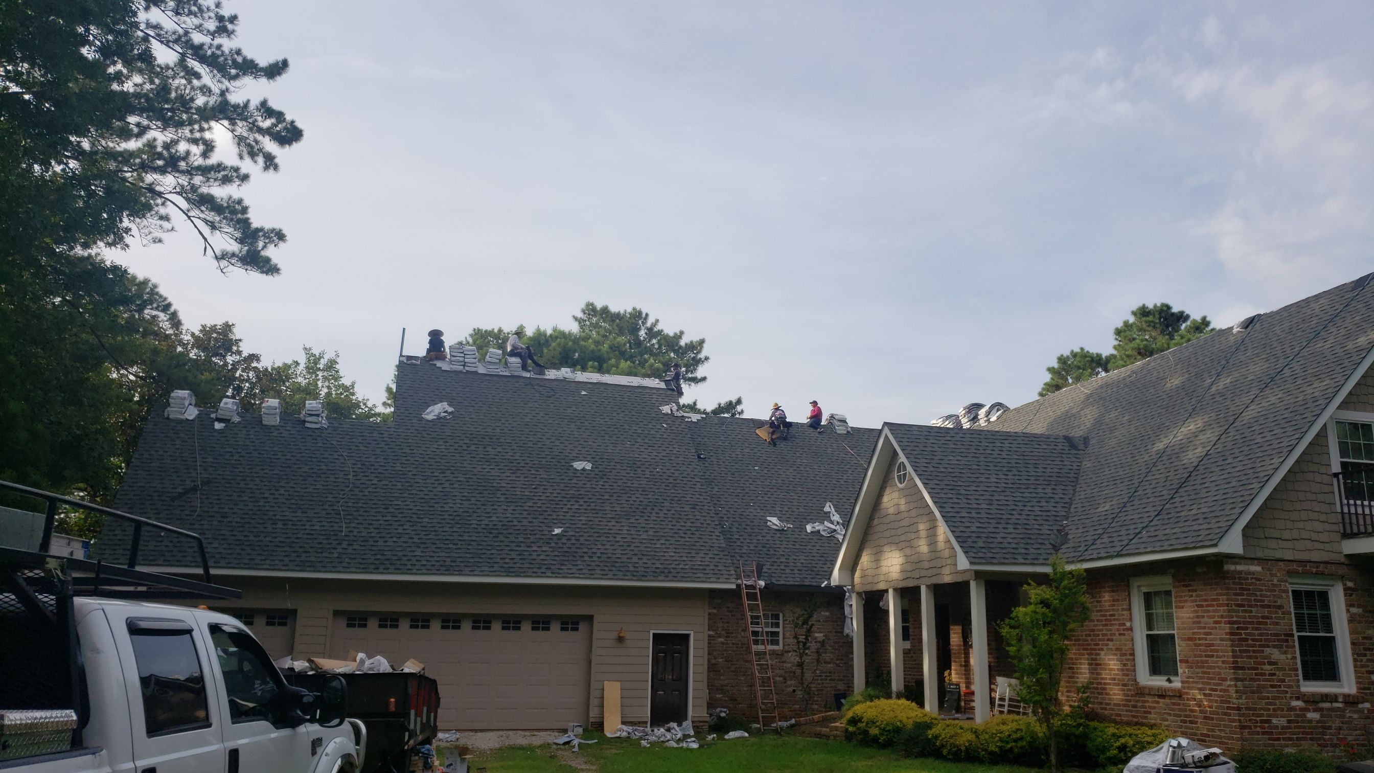 Residential Roofing Installation using Roof Replacement by American Roofing & Construction LLC